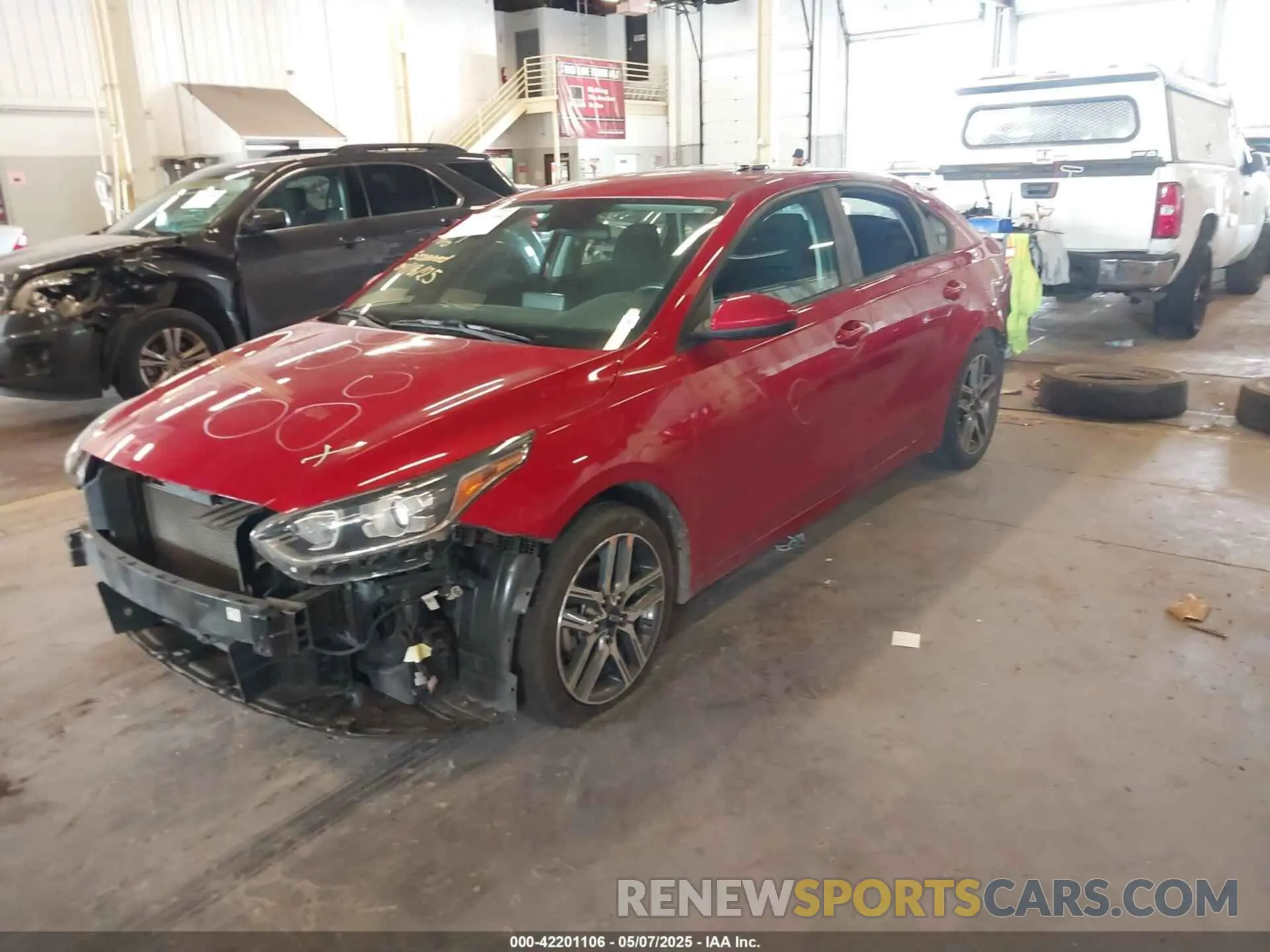 2 fotografías del automóvil dañado 3KPF34AD9KE013656 KIA FORTE 2019
