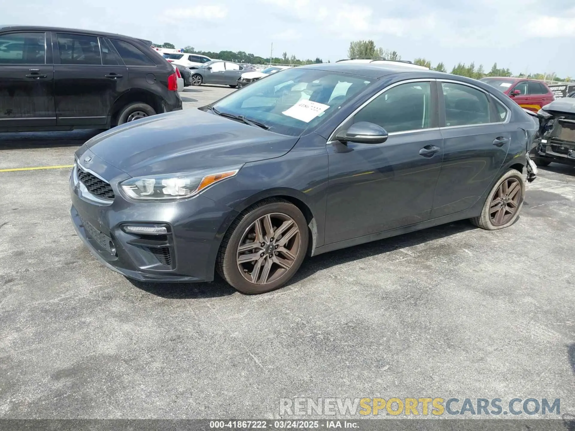 2 fotografías del automóvil dañado 3KPF54AD8KE028398 KIA FORTE 2019