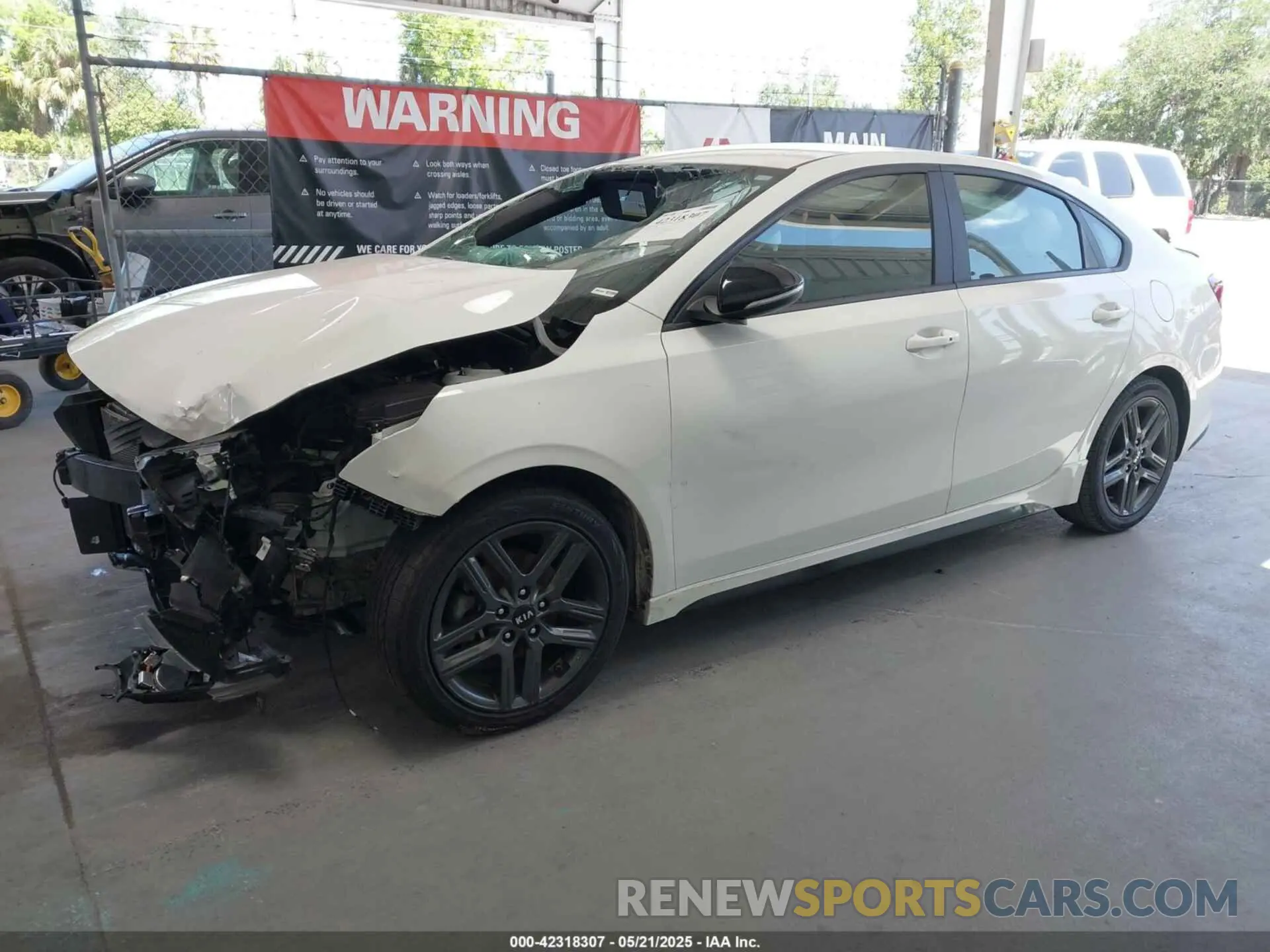 2 fotografías del automóvil dañado 3KPF34AD3LE213966 KIA FORTE 2020