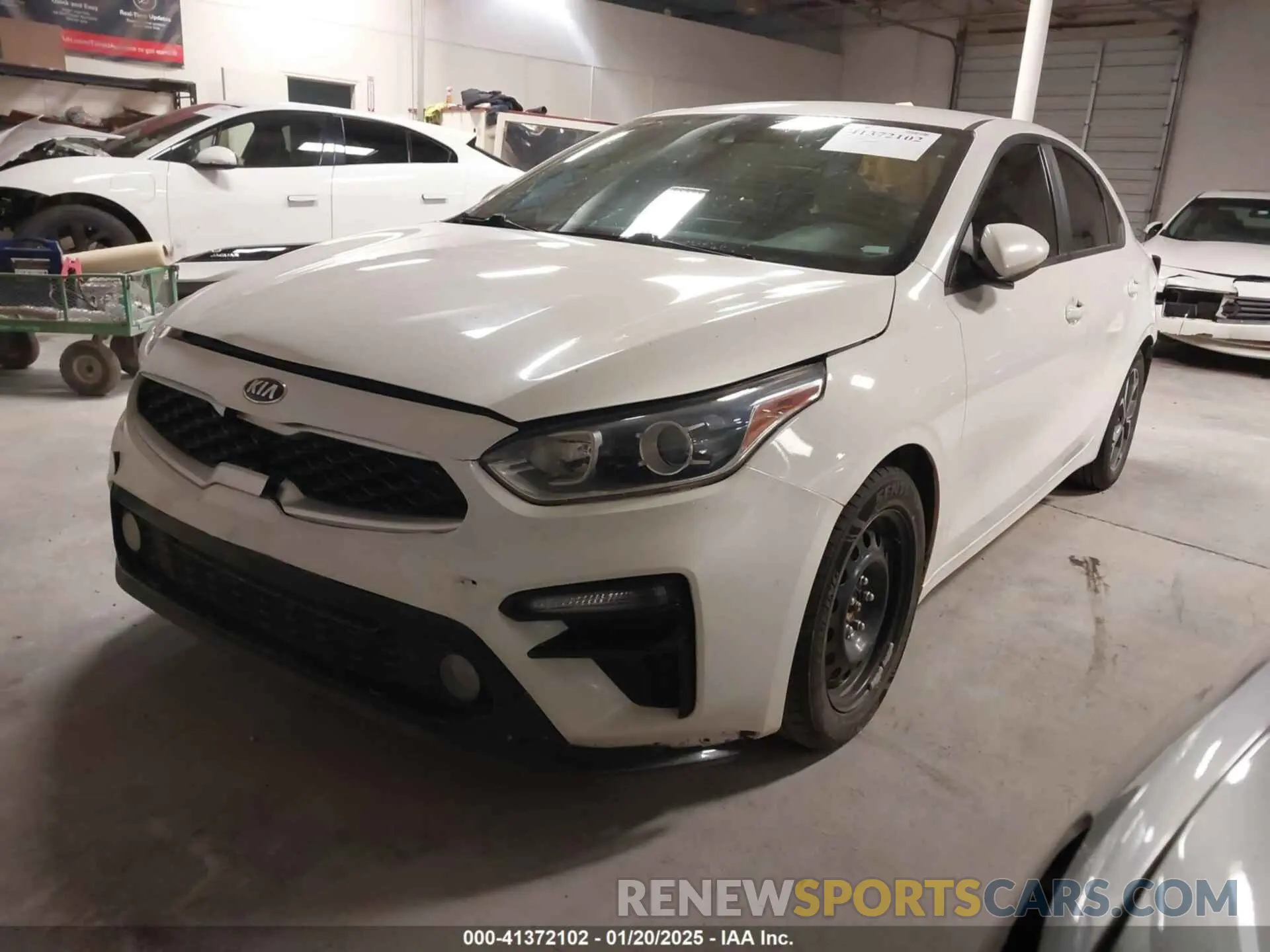 2 fotografías del automóvil dañado 3KPF24AD2ME280191 KIA FORTE 2021