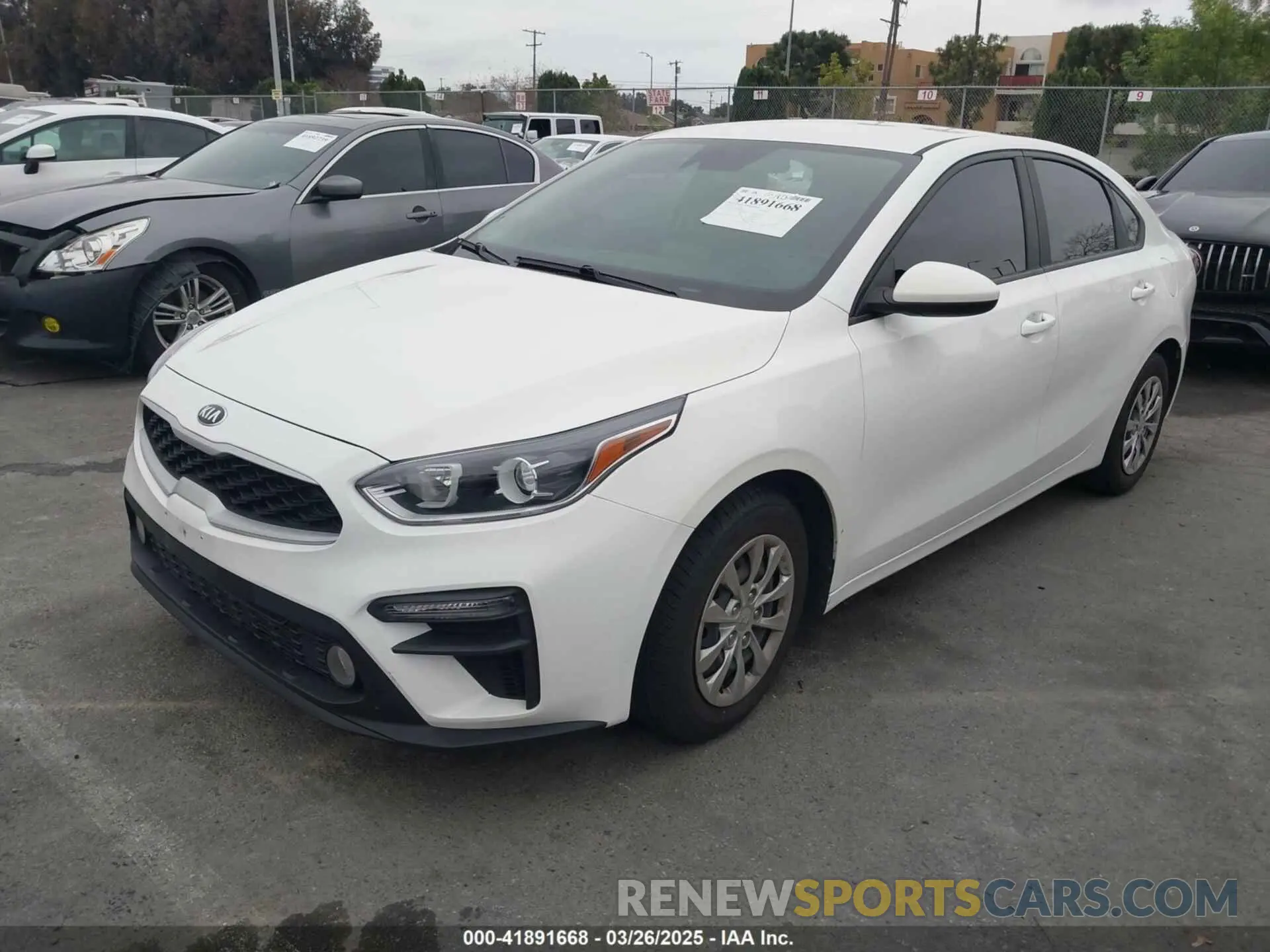 2 fotografías del automóvil dañado 3KPF24AD2ME345167 KIA FORTE 2021