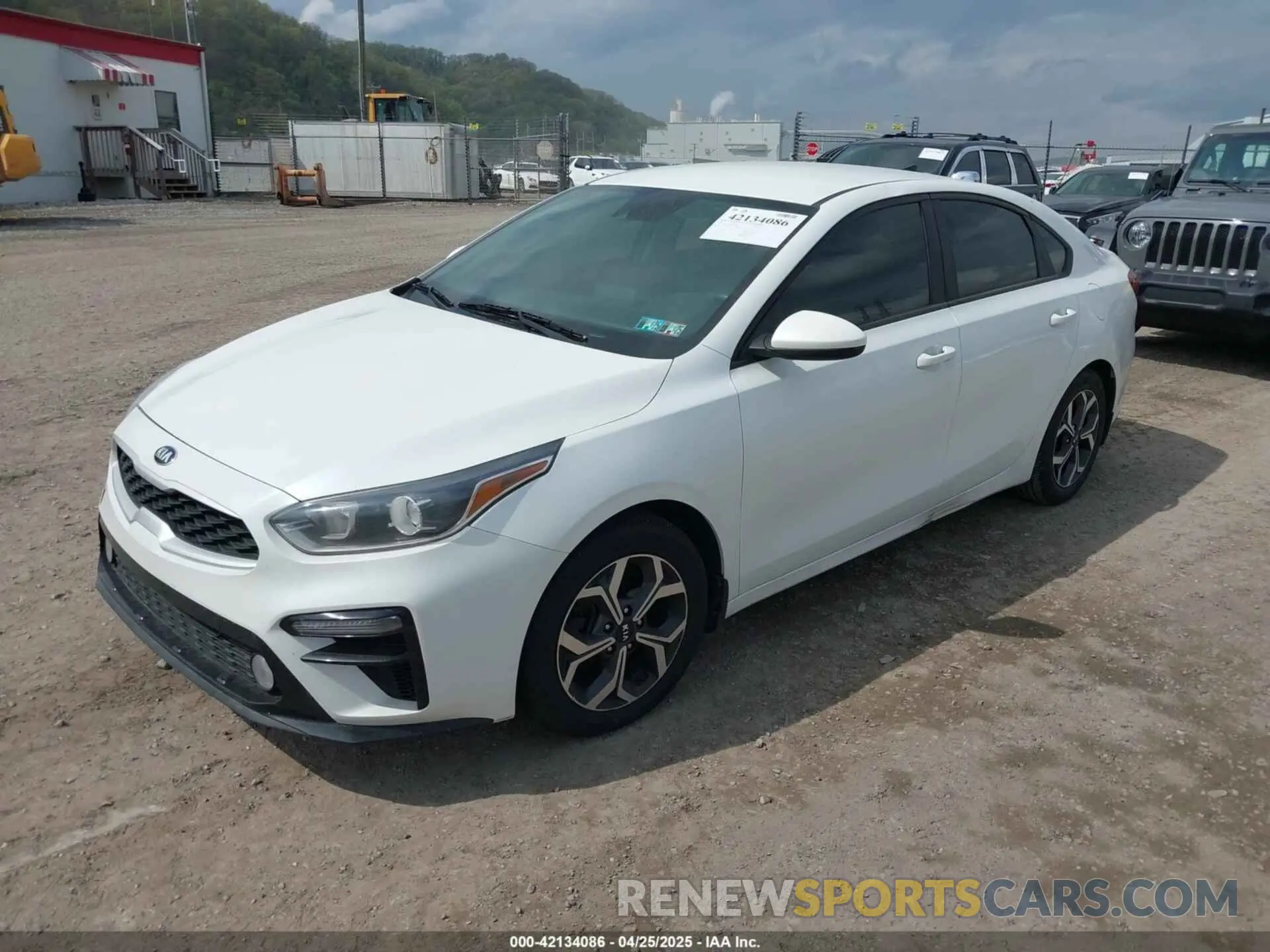 2 fotografías del automóvil dañado 3KPF24AD4ME313658 KIA FORTE 2021