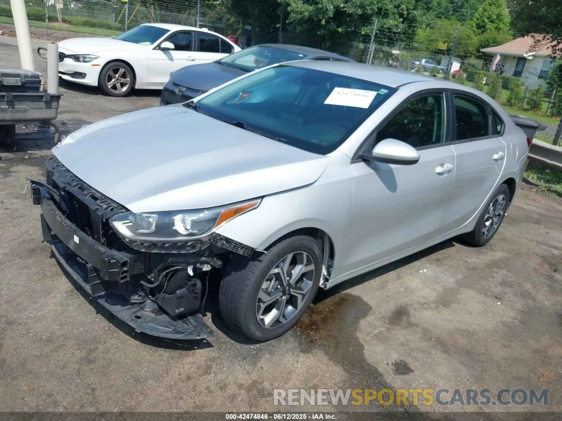 2 fotografías del automóvil dañado 3KPF24AD4ME331948 KIA FORTE 2021