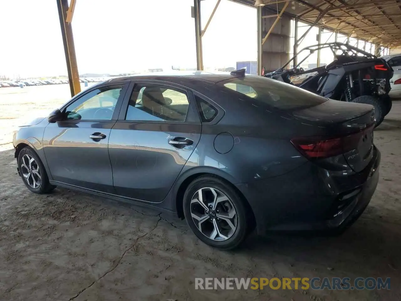 2 fotografías del automóvil dañado 3KPF24AD8ME329314 KIA FORTE 2021