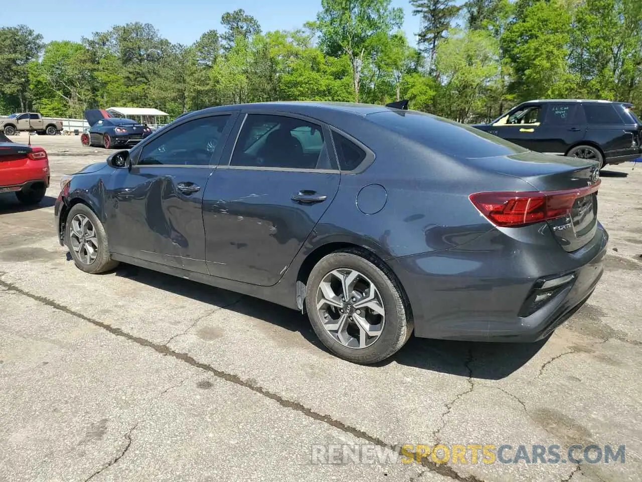 2 fotografías del automóvil dañado 3KPF24AD8ME386693 KIA FORTE 2021