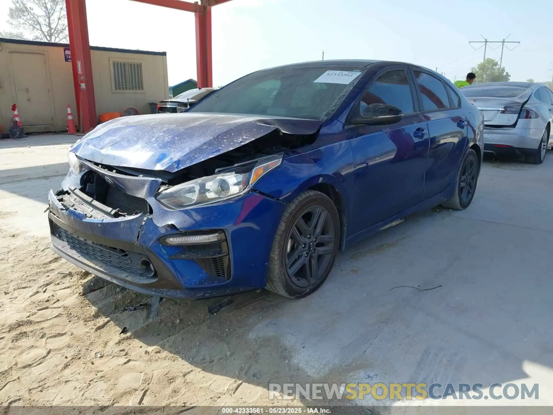 2 fotografías del automóvil dañado 3KPF34AD2ME386931 KIA FORTE 2021