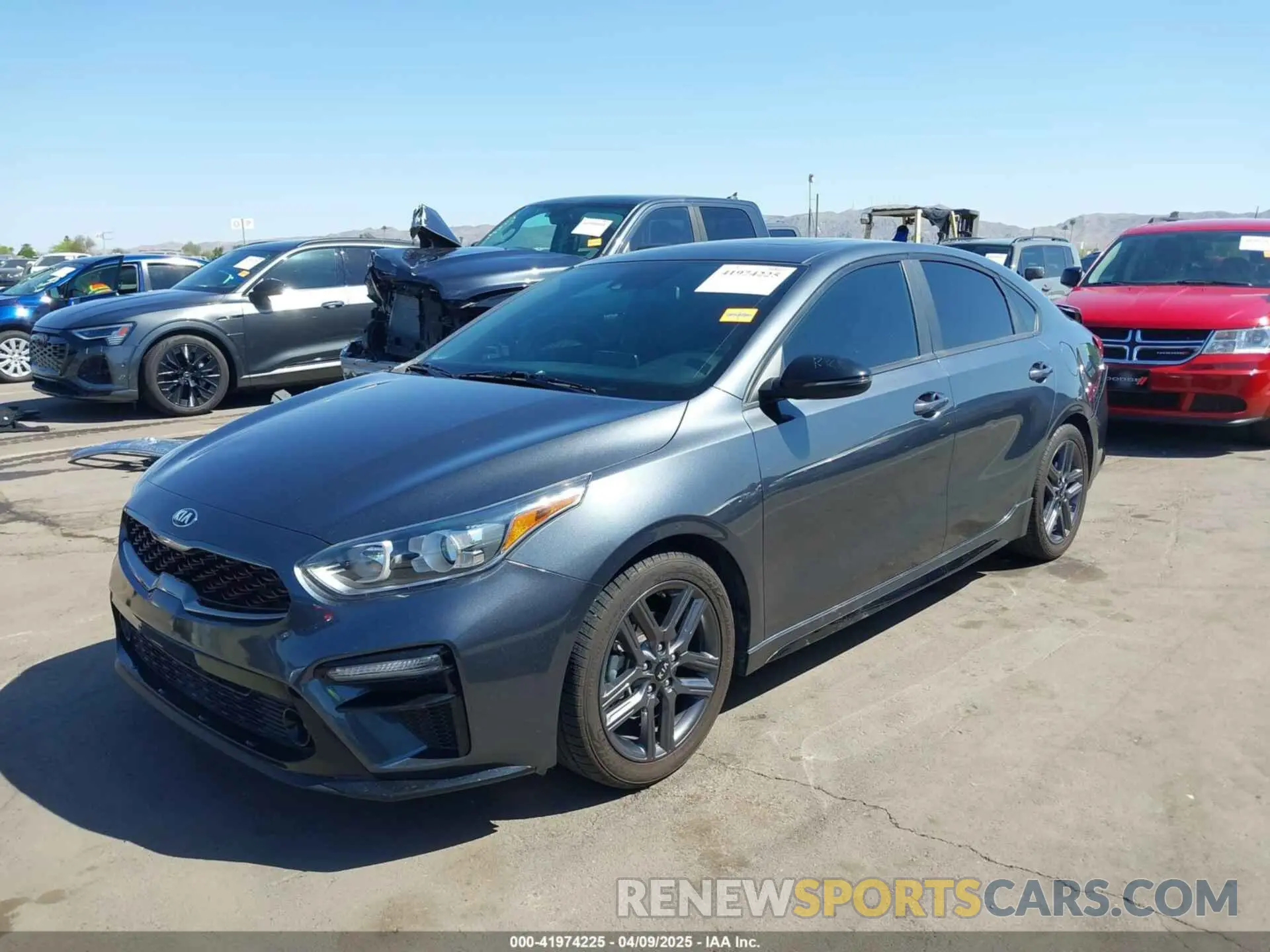2 fotografías del automóvil dañado 3KPF34AD9ME329982 KIA FORTE 2021
