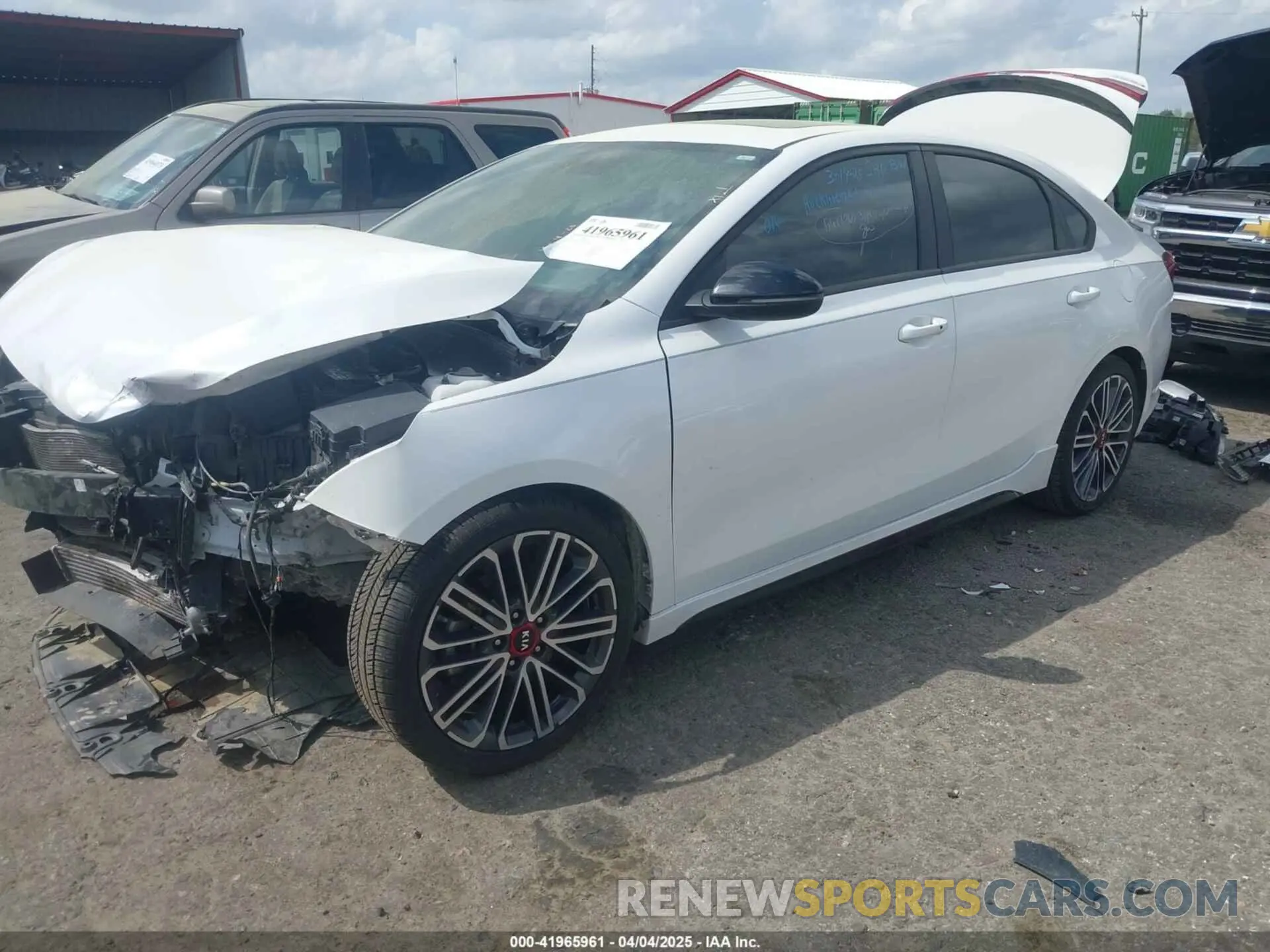 2 fotografías del automóvil dañado 3KPF44AC7ME318340 KIA FORTE 2021