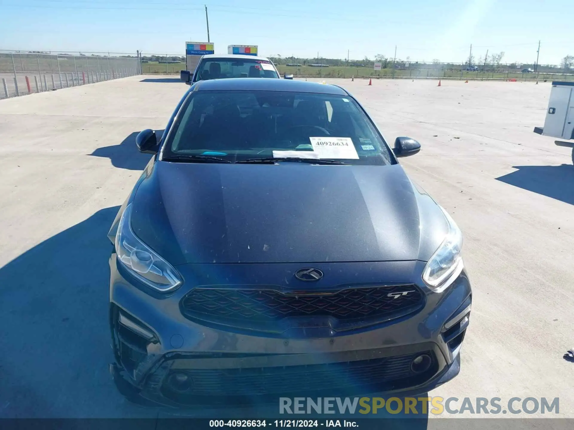 12 fotografías del automóvil dañado 3KPF44AC9ME414647 KIA FORTE 2021