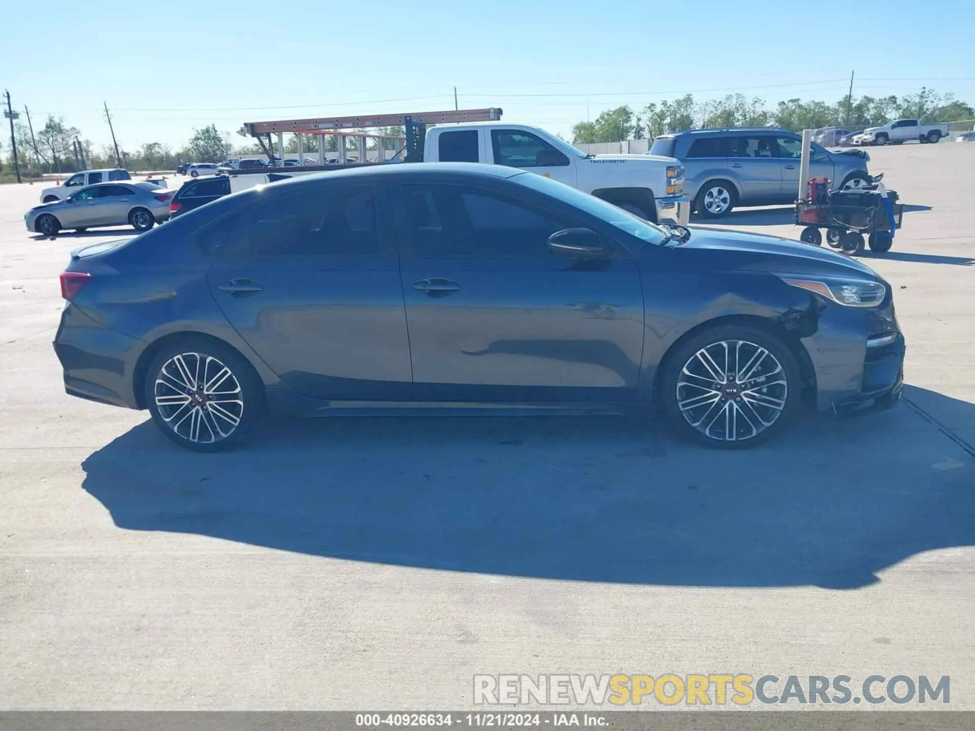 13 fotografías del automóvil dañado 3KPF44AC9ME414647 KIA FORTE 2021