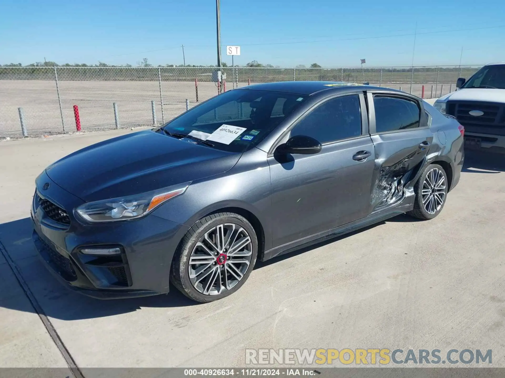 2 fotografías del automóvil dañado 3KPF44AC9ME414647 KIA FORTE 2021