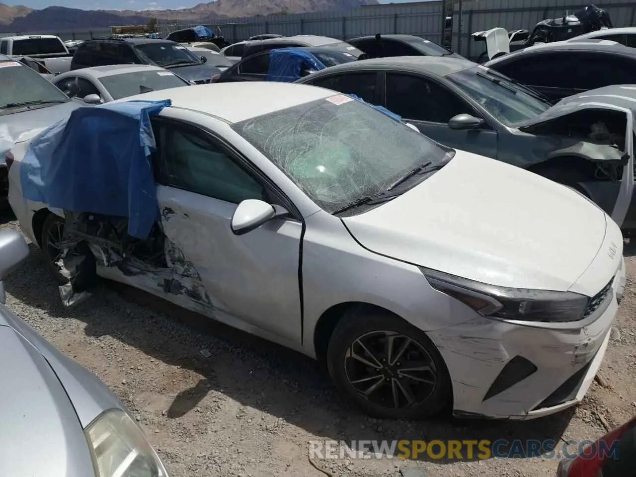 4 fotografías del automóvil dañado 3KPF24AD0NE431059 KIA FORTE 2022