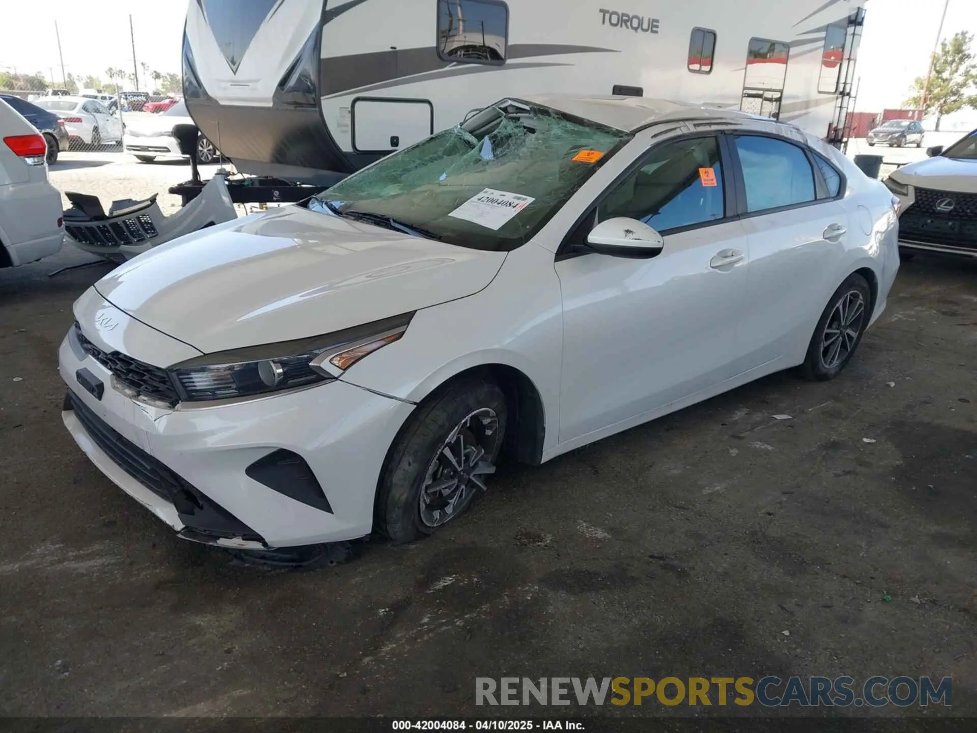 2 fotografías del automóvil dañado 3KPF24AD2NE425361 KIA FORTE 2022