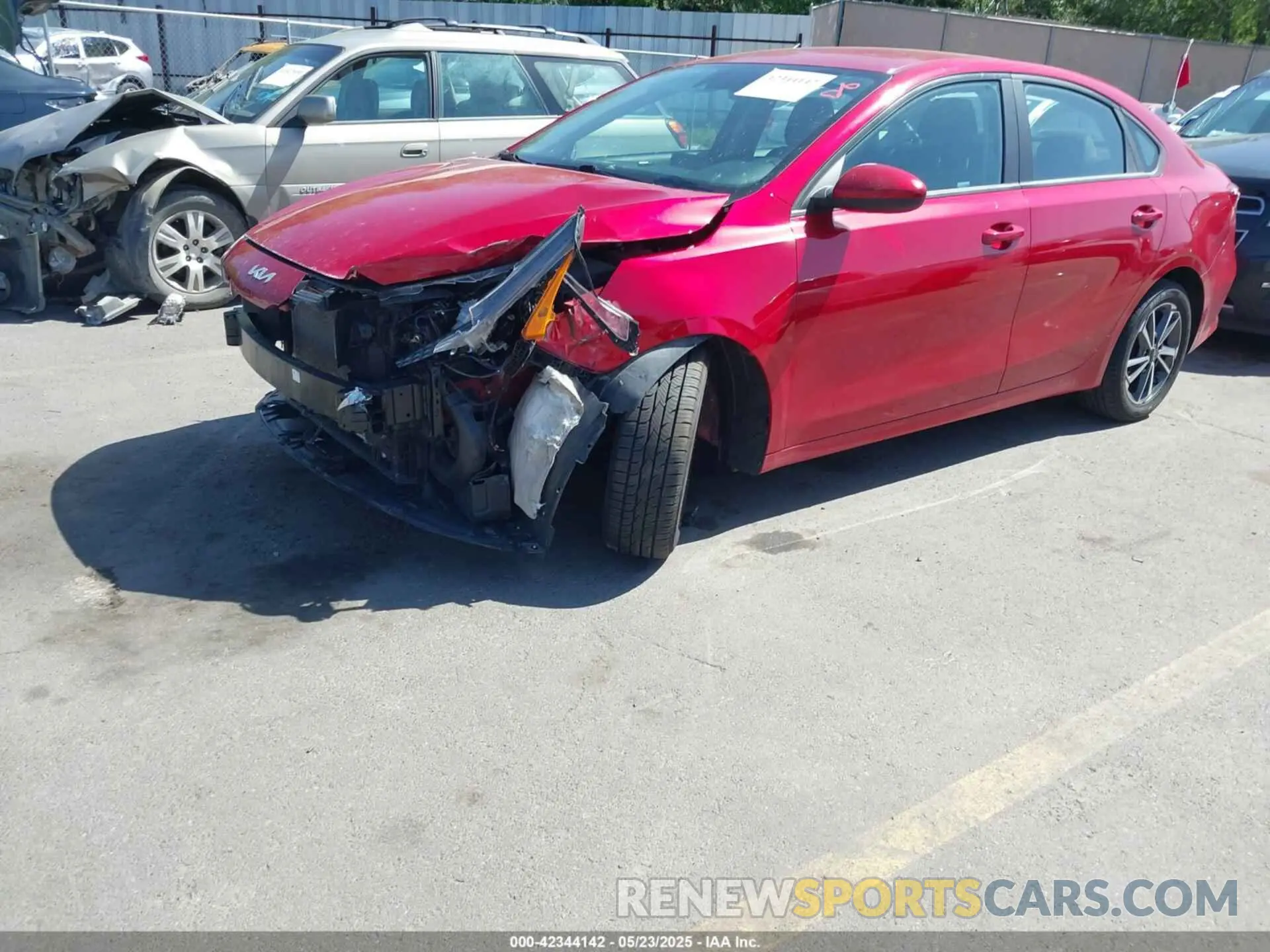 2 fotografías del automóvil dañado 3KPF24AD2NE451474 KIA FORTE 2022