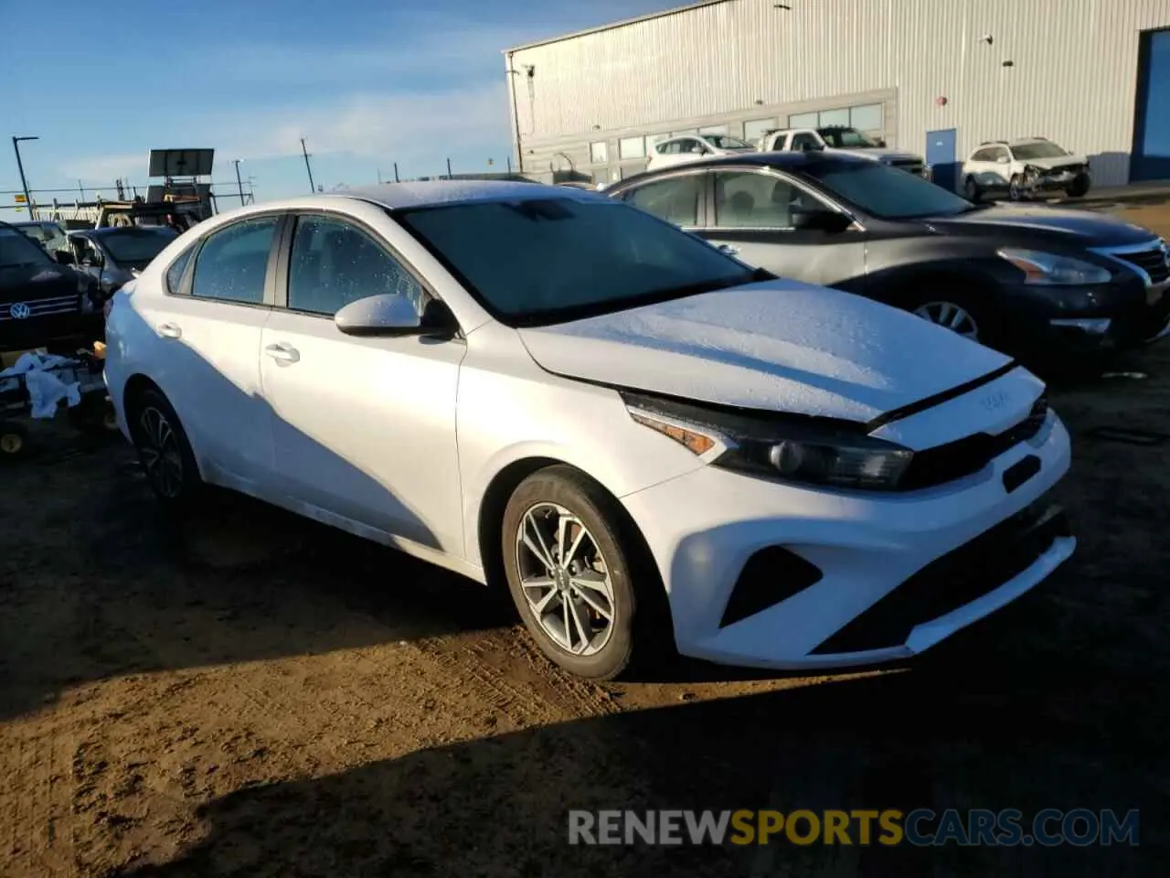 4 fotografías del automóvil dañado 3KPF24AD3NE427653 KIA FORTE 2022