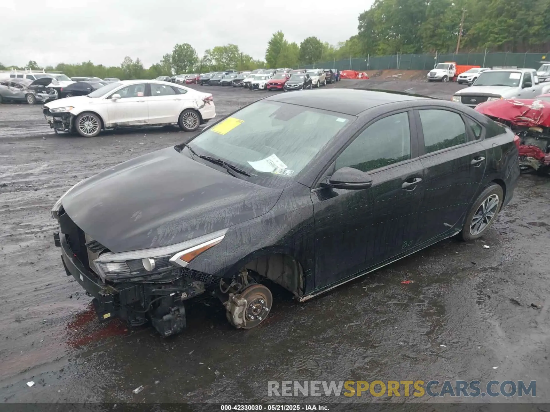 2 fotografías del automóvil dañado 3KPF24AD4NE429525 KIA FORTE 2022