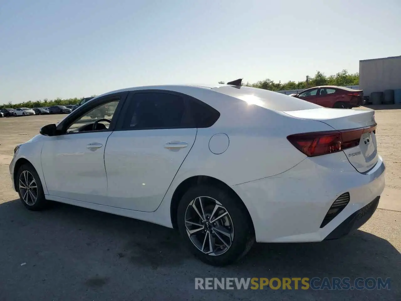 2 fotografías del automóvil dañado 3KPF24AD6NE433267 KIA FORTE 2022