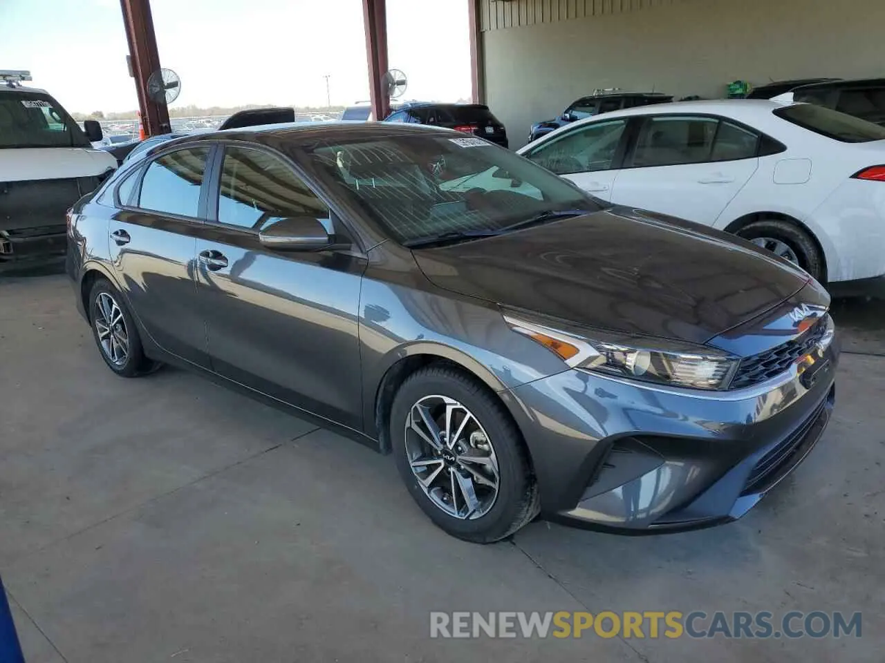 4 fotografías del automóvil dañado 3KPF24AD8NE428992 KIA FORTE 2022