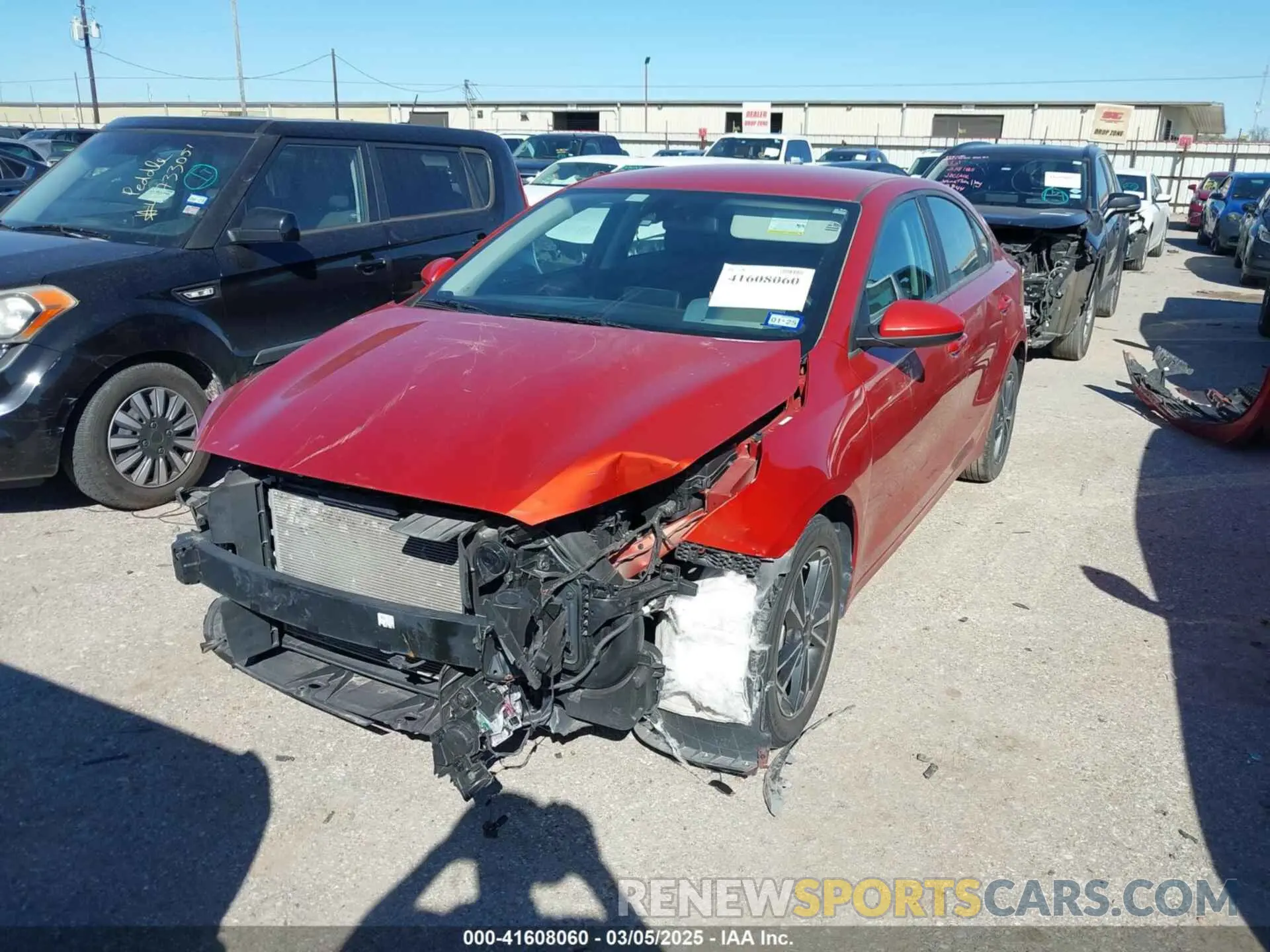 2 fotografías del automóvil dañado 3KPF24AD8NE451334 KIA FORTE 2022