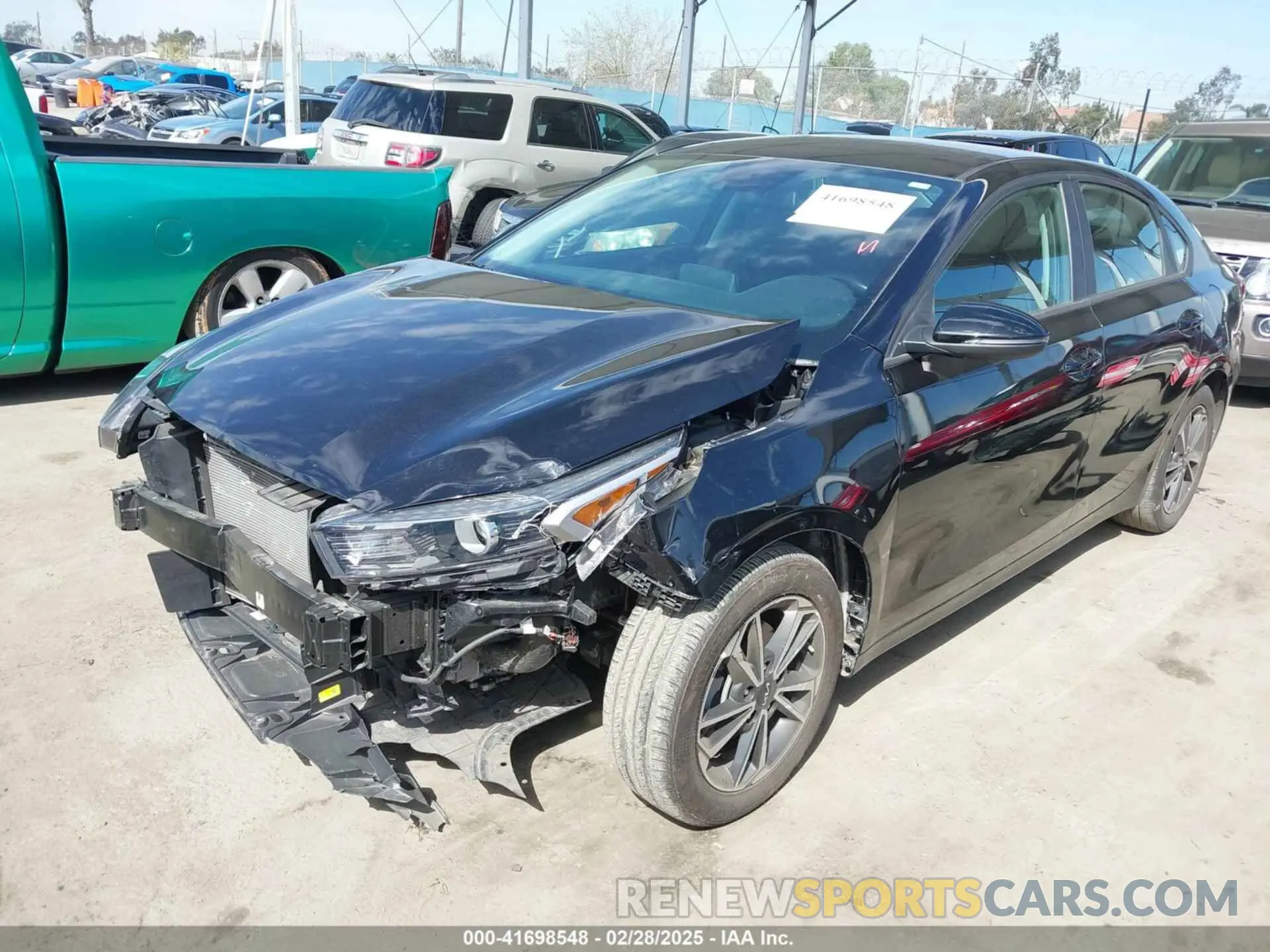 2 fotografías del automóvil dañado 3KPF24AD9NE492622 KIA FORTE 2022