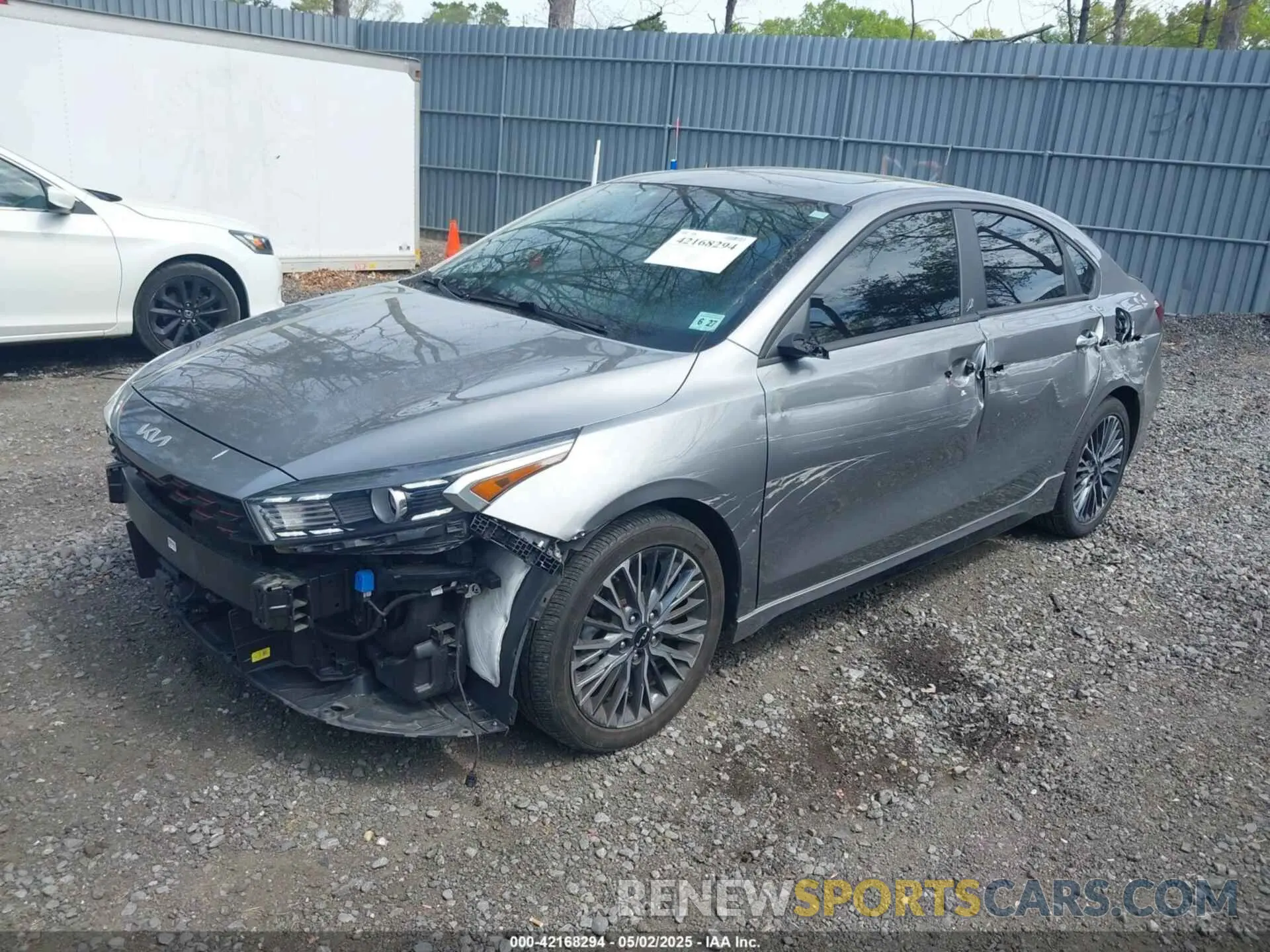 2 fotografías del automóvil dañado 3KPF54AD0NE490720 KIA FORTE 2022