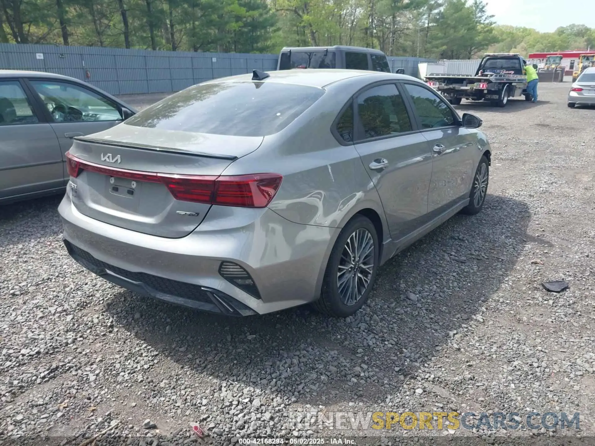 4 fotografías del automóvil dañado 3KPF54AD0NE490720 KIA FORTE 2022