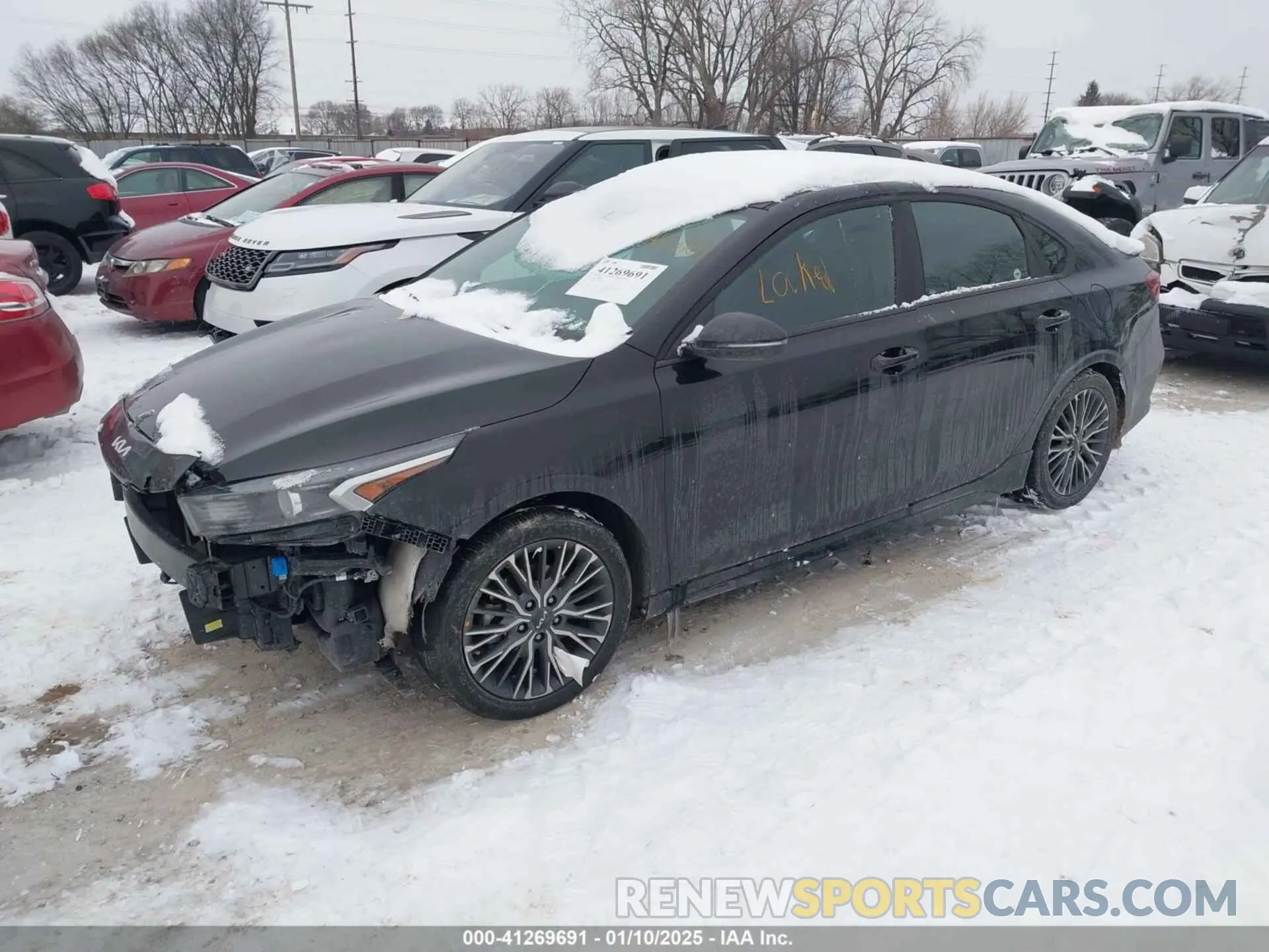 2 fotografías del automóvil dañado 3KPF54AD0NE492094 KIA FORTE 2022