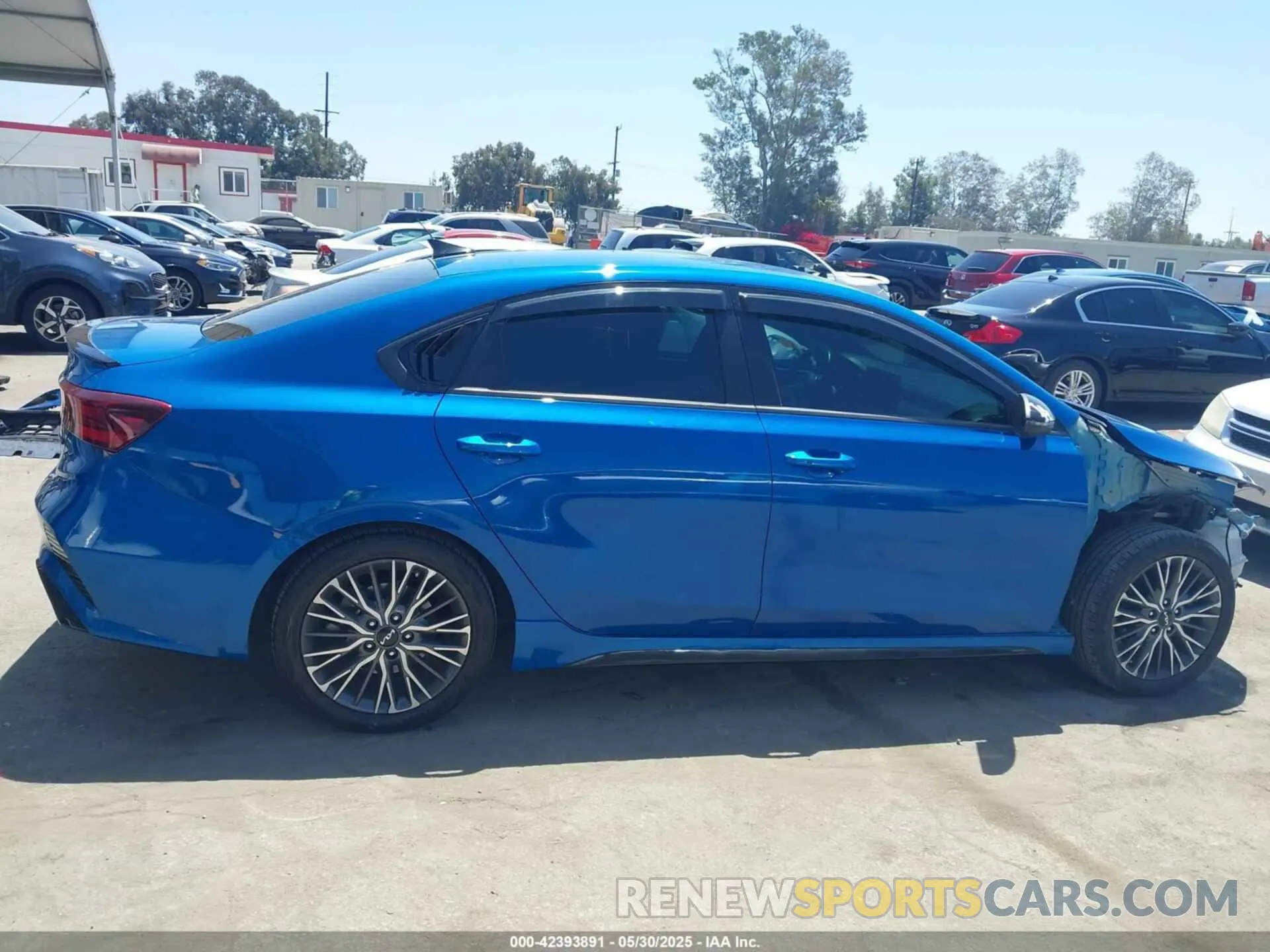 14 fotografías del automóvil dañado 3KPF54AD1NE431093 KIA FORTE 2022