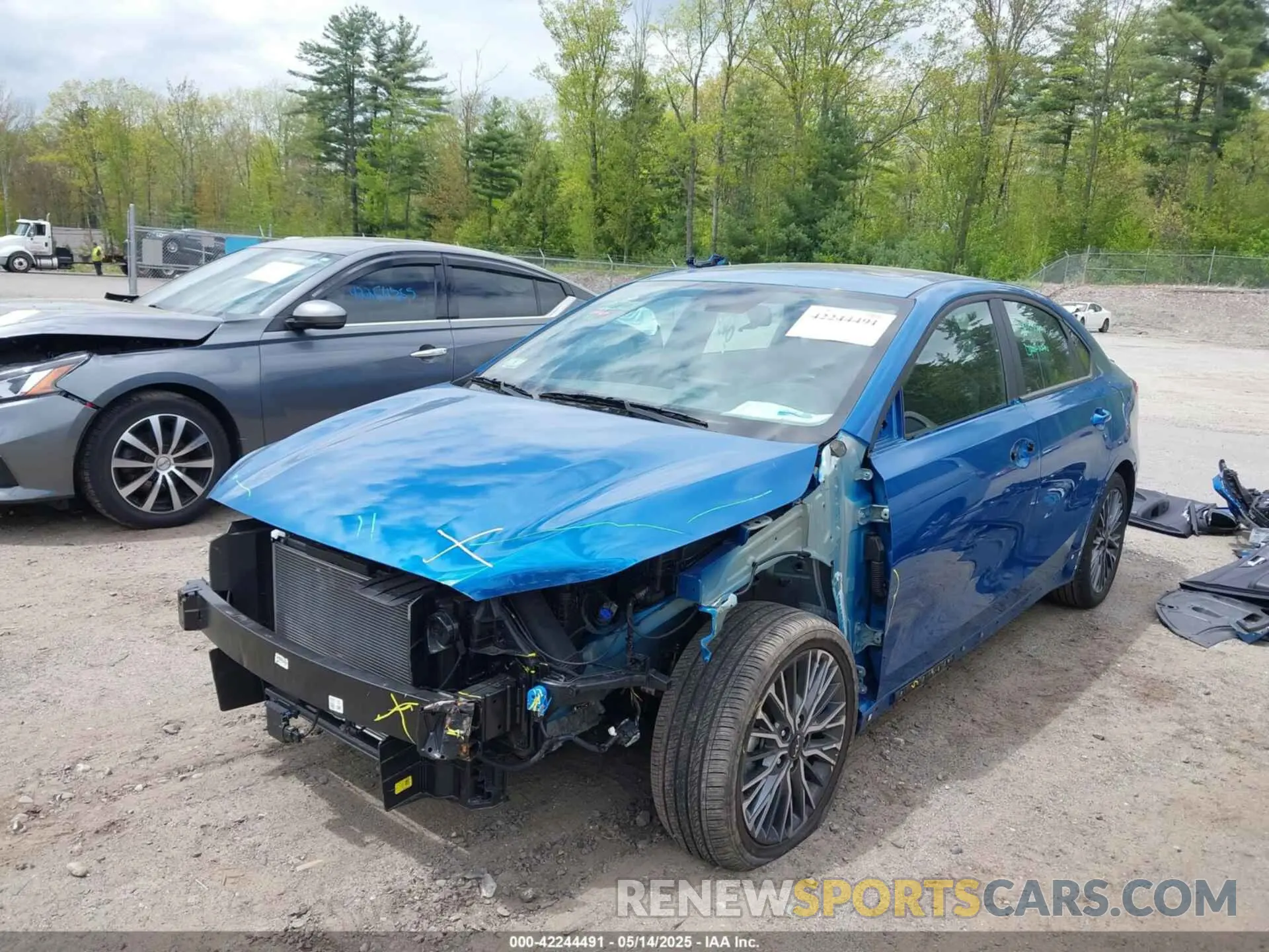 2 fotografías del automóvil dañado 3KPF54AD1NE477930 KIA FORTE 2022