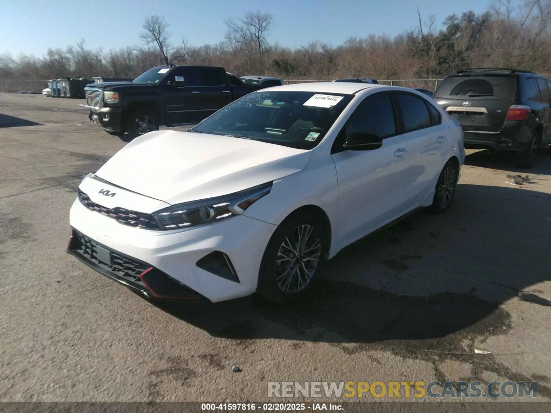 2 fotografías del automóvil dañado 3KPF54AD4NE452598 KIA FORTE 2022