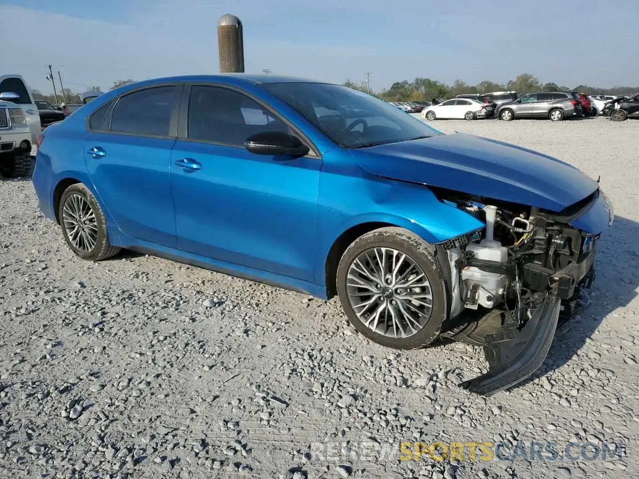 4 fotografías del automóvil dañado 3KPF54AD4NE498383 KIA FORTE 2022