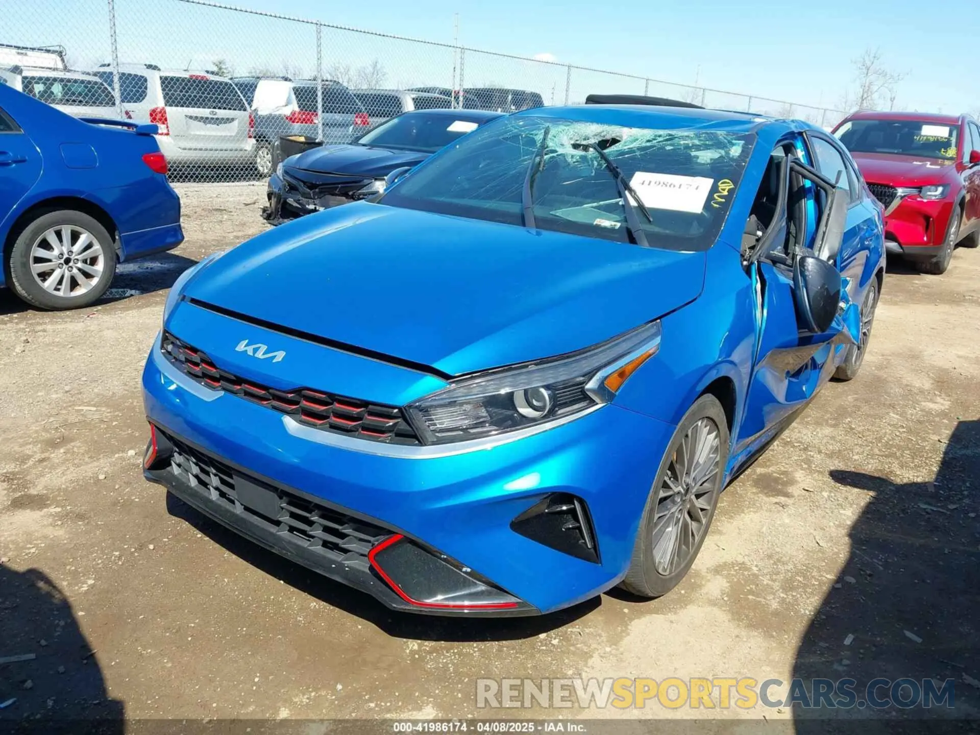 2 fotografías del automóvil dañado 3KPF54AD4NE504277 KIA FORTE 2022