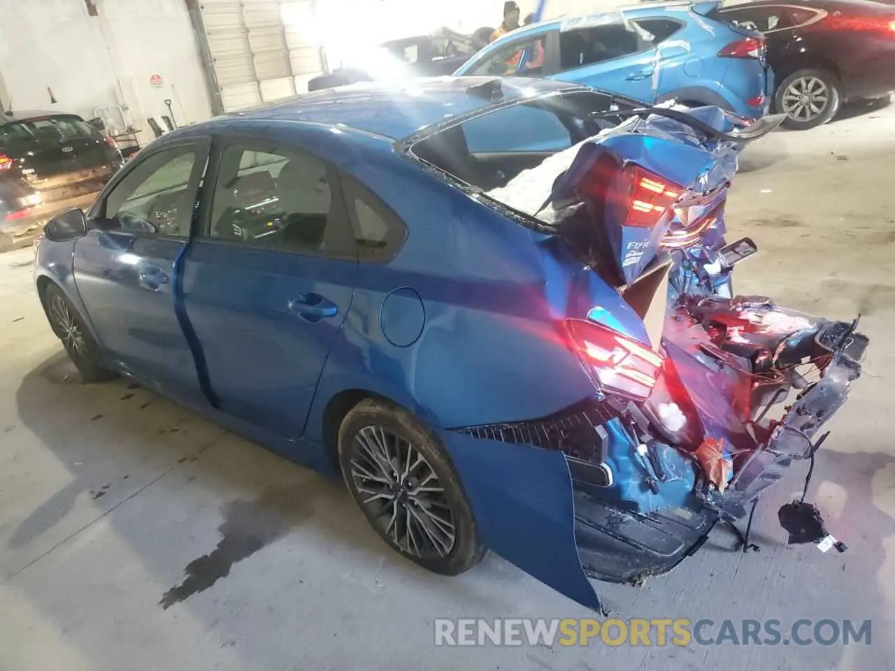 2 fotografías del automóvil dañado 3KPF54AD6NE505222 KIA FORTE 2022