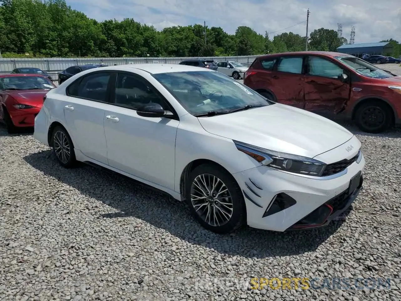 4 fotografías del automóvil dañado 3KPF54AD6NE507939 KIA FORTE 2022