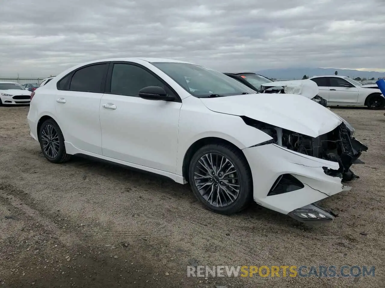 4 fotografías del automóvil dañado 3KPF54AD7NE498118 KIA FORTE 2022