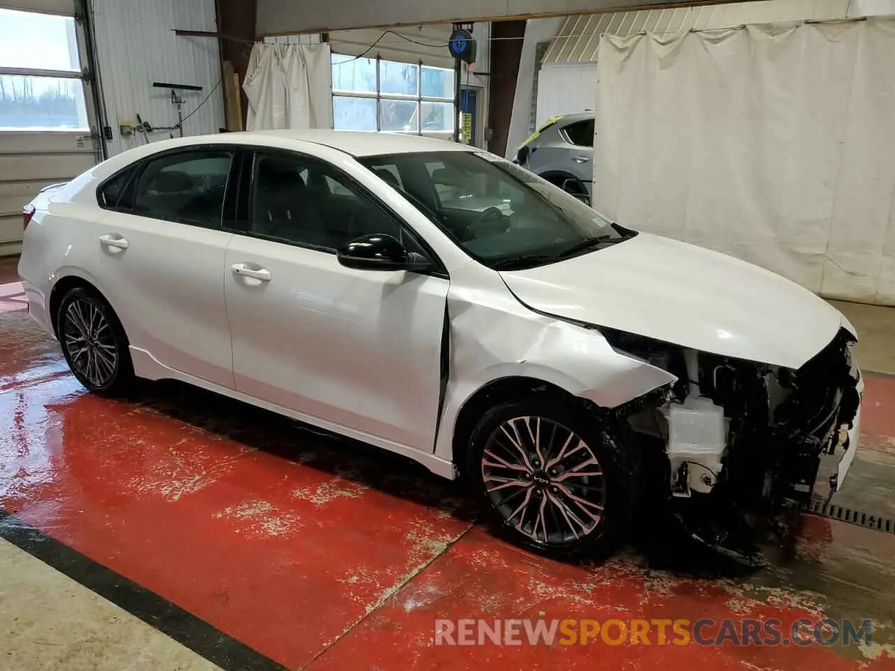 4 fotografías del automóvil dañado 3KPF54AD7NE499088 KIA FORTE 2022