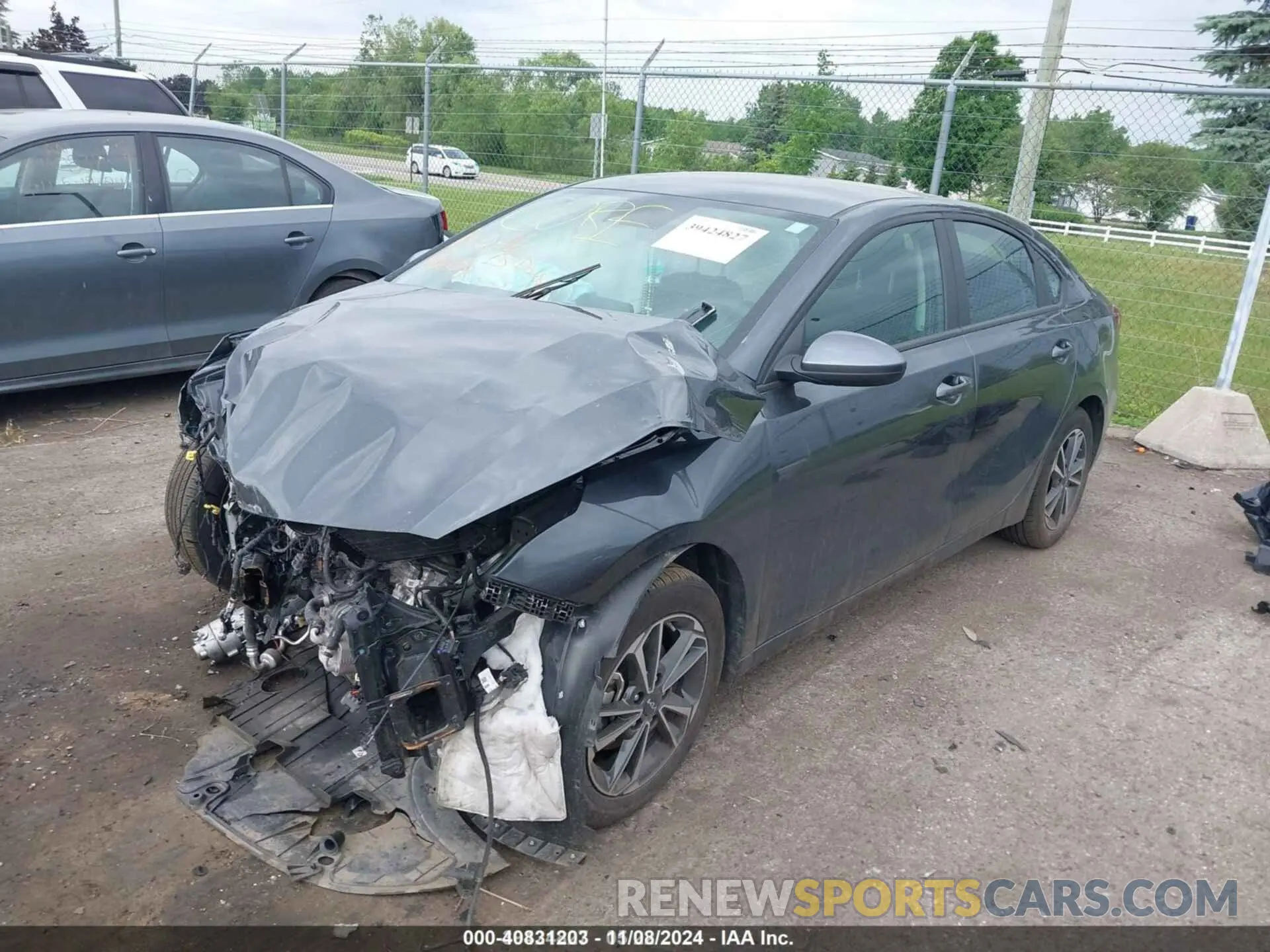 2 fotografías del automóvil dañado 3KPF24AD0PE668637 KIA FORTE 2023