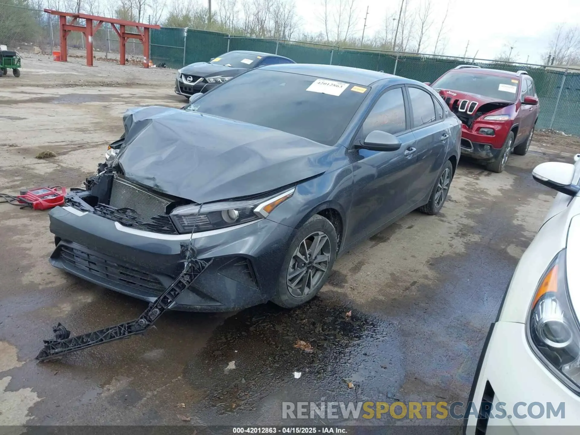 2 fotografías del automóvil dañado 3KPF24AD1PE668548 KIA FORTE 2023