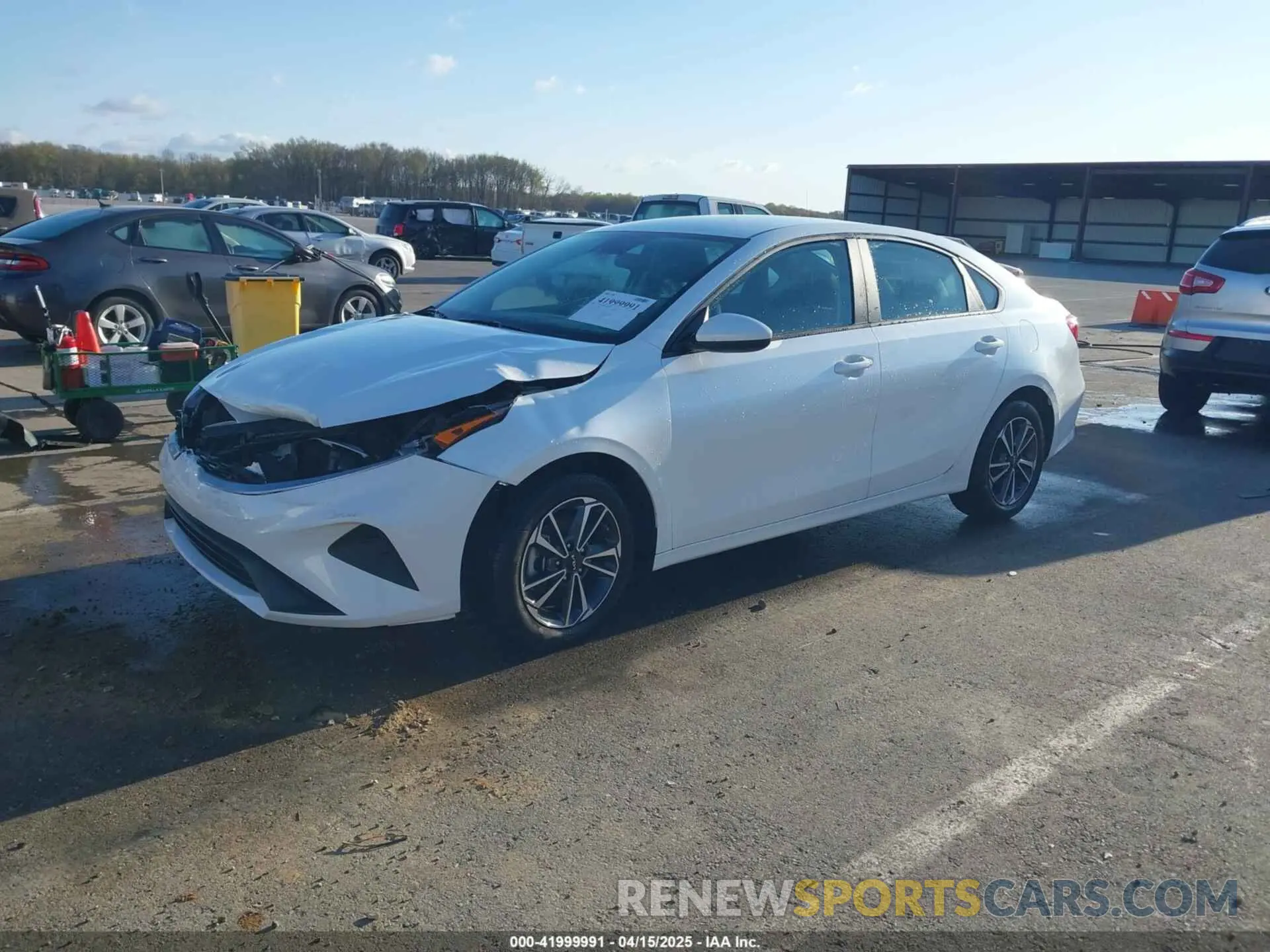2 fotografías del automóvil dañado 3KPF24AD5PE619448 KIA FORTE 2023