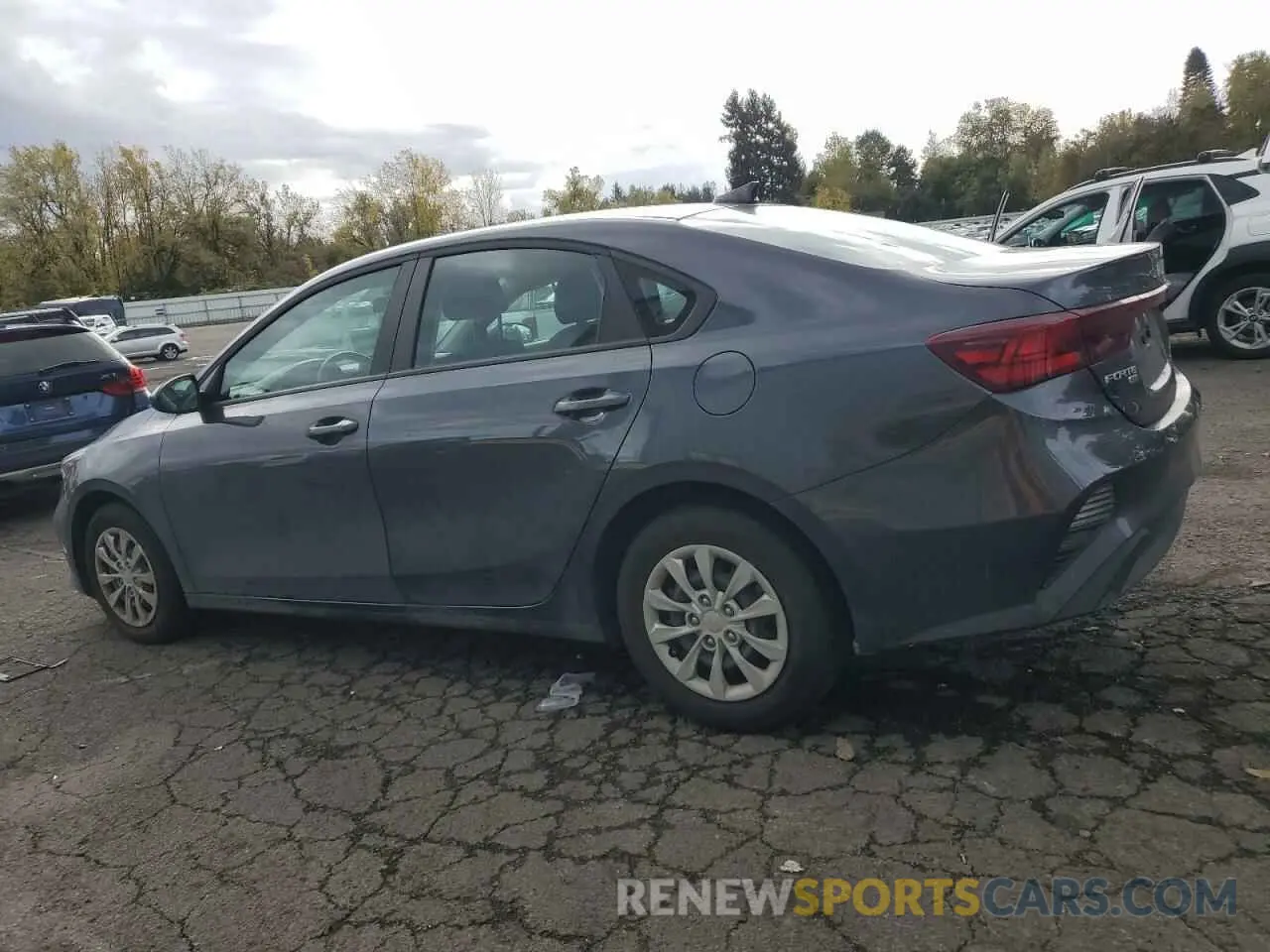 2 fotografías del automóvil dañado 3KPF24AD6PE609205 KIA FORTE 2023
