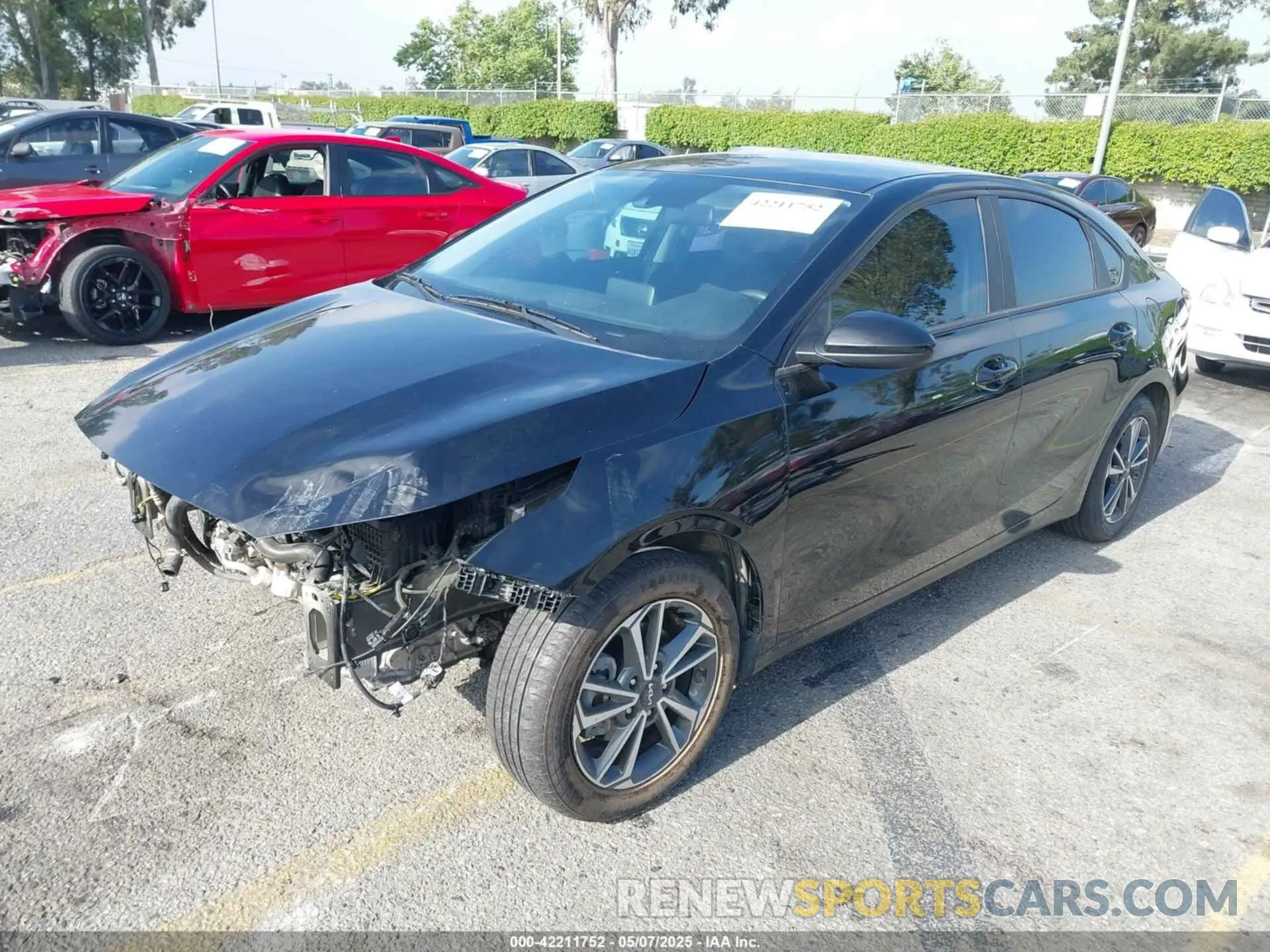 2 fotografías del automóvil dañado 3KPF24AD7PE550875 KIA FORTE 2023