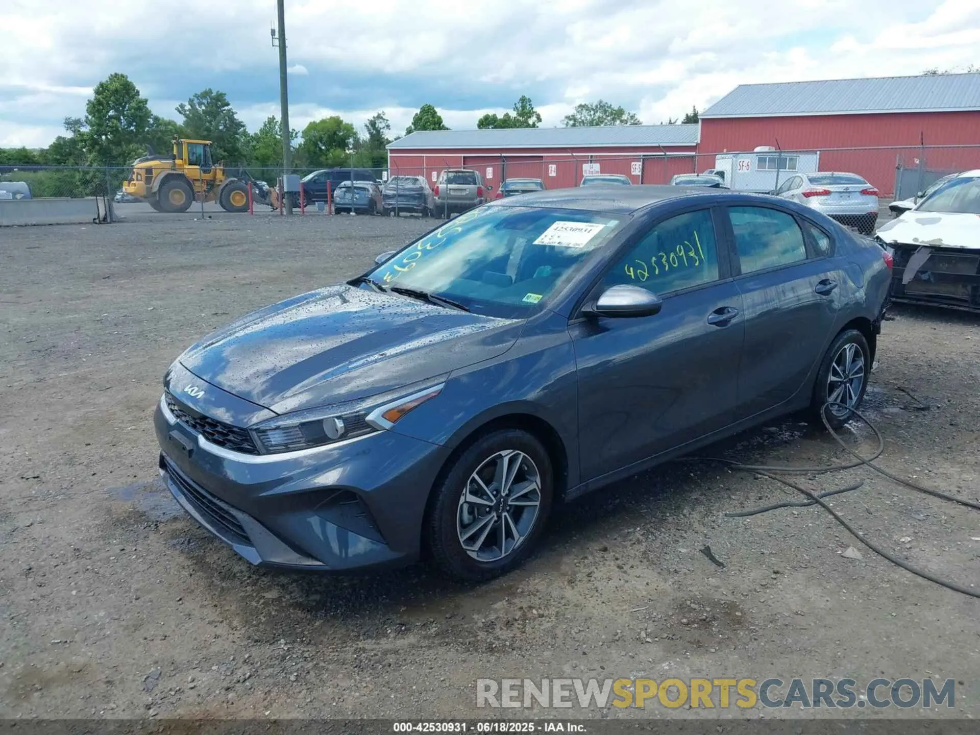 2 fotografías del automóvil dañado 3KPF24AD7PE693390 KIA FORTE 2023