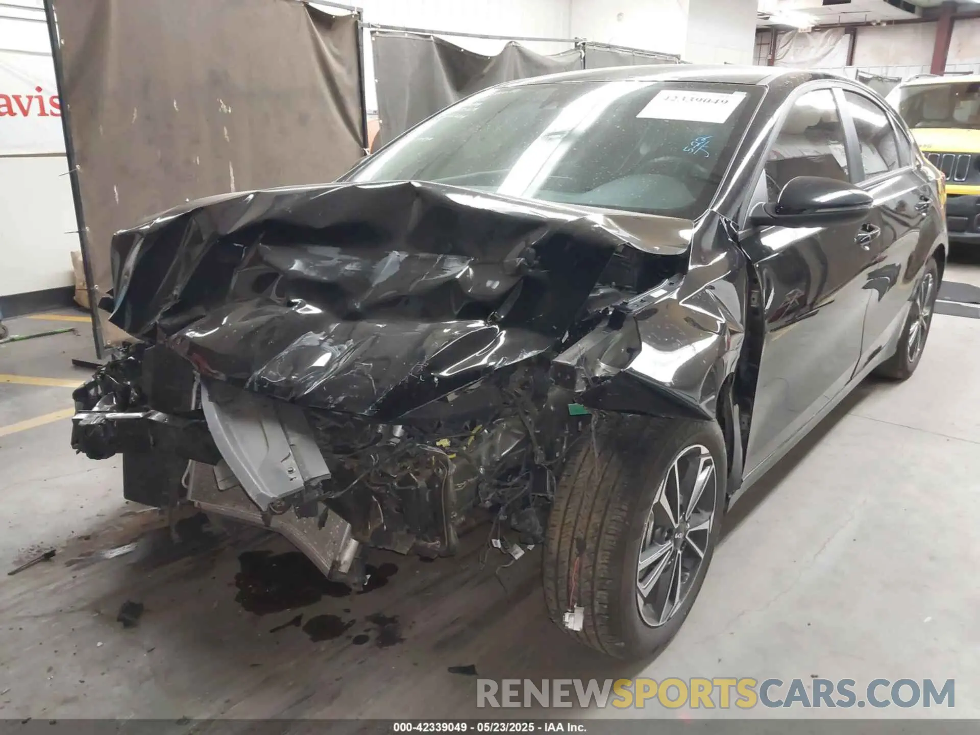 2 fotografías del automóvil dañado 3KPF24AD8PE682060 KIA FORTE 2023