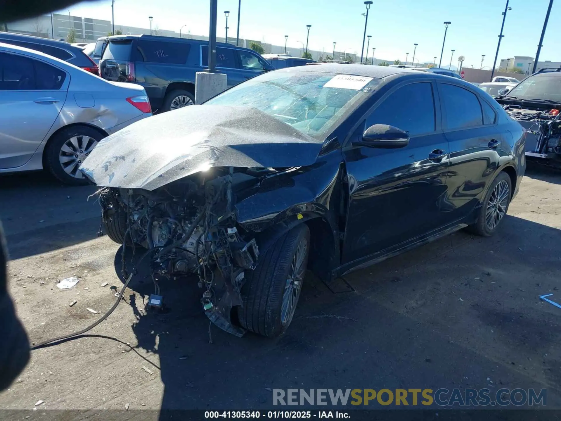 2 fotografías del automóvil dañado 3KPF54AD1PE652793 KIA FORTE 2023
