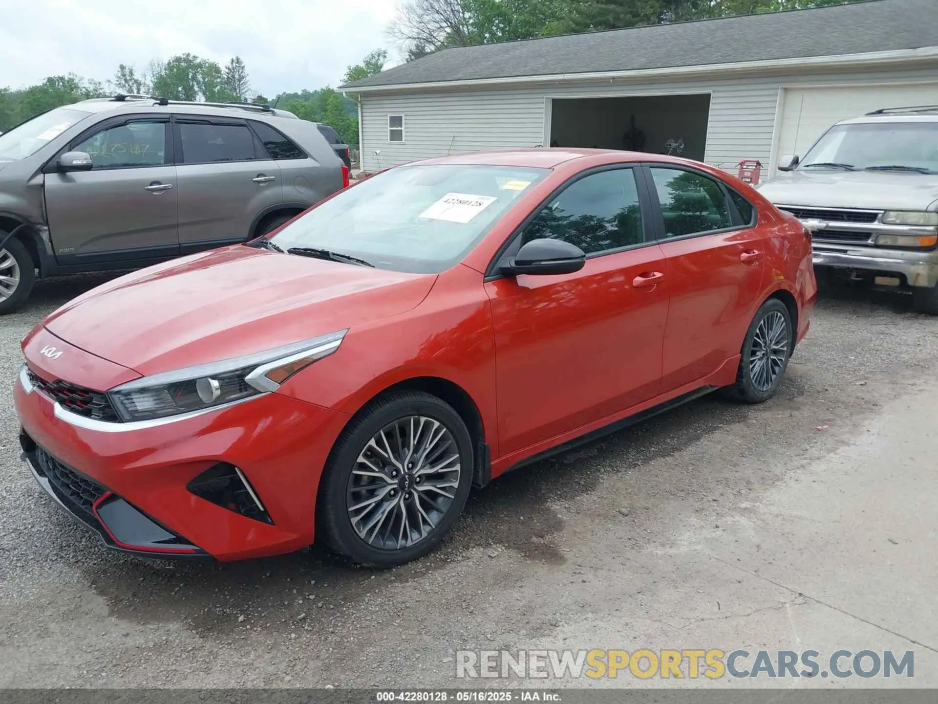 2 fotografías del automóvil dañado 3KPF54AD3PE629435 KIA FORTE 2023