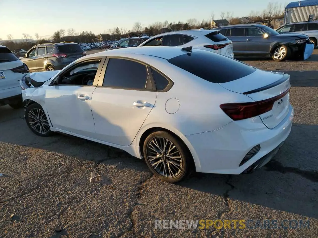 2 fotografías del automóvil dañado 3KPF54AD5PE679799 KIA FORTE 2023