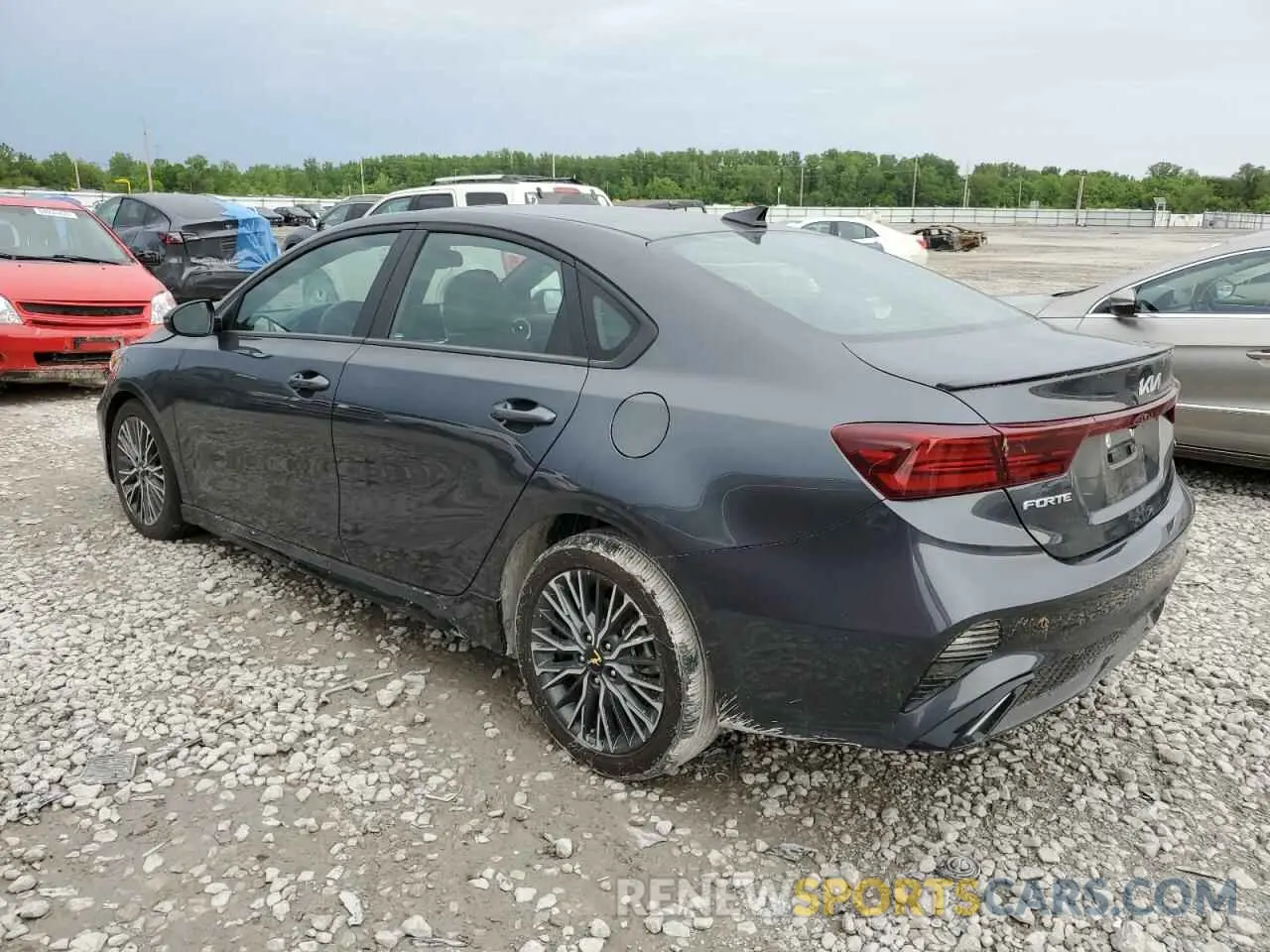 2 fotografías del automóvil dañado 3KPF54AD6PE650215 KIA FORTE 2023