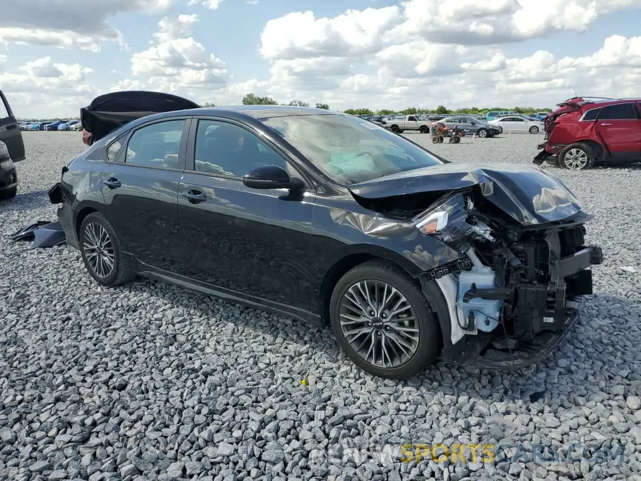 4 fotografías del automóvil dañado 3KPF54AD9PE565160 KIA FORTE 2023