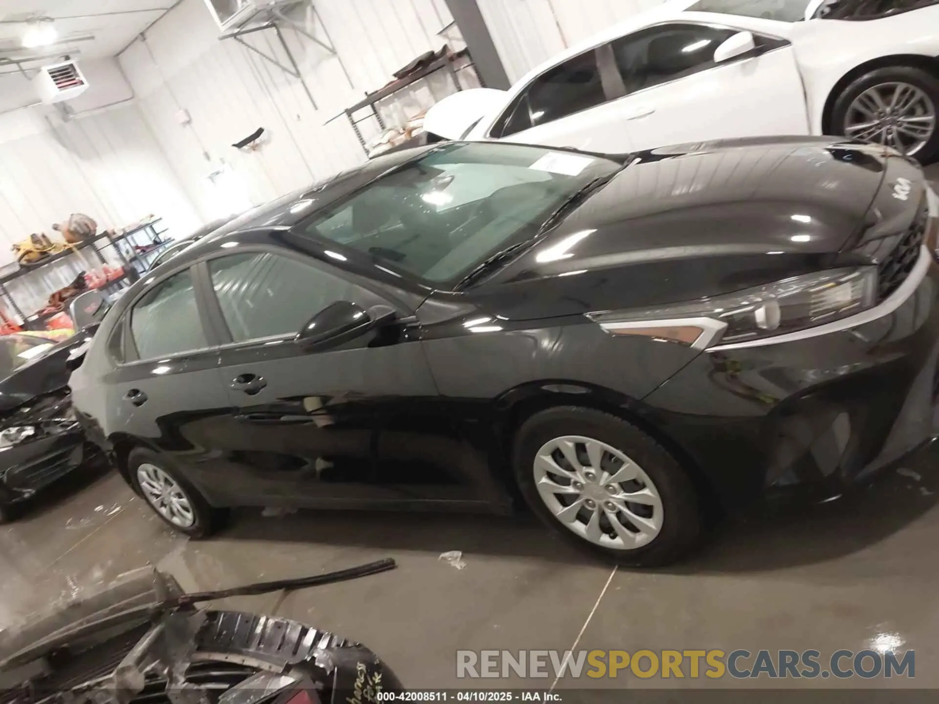 14 fotografías del automóvil dañado 3KPF24AD2RE811915 KIA FORTE 2024