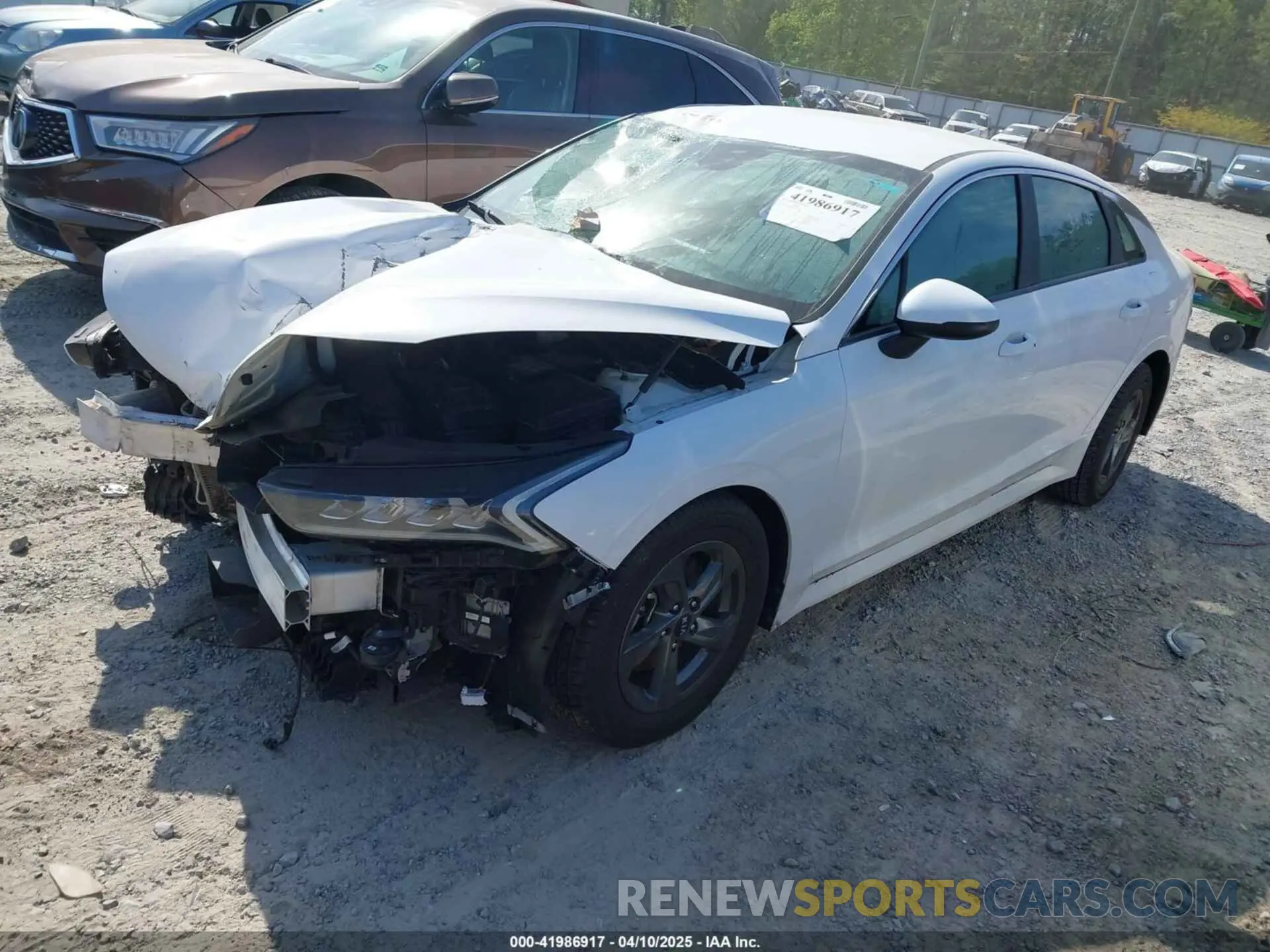 2 fotografías del automóvil dañado 5XXG14J24MG043585 KIA K5 2021